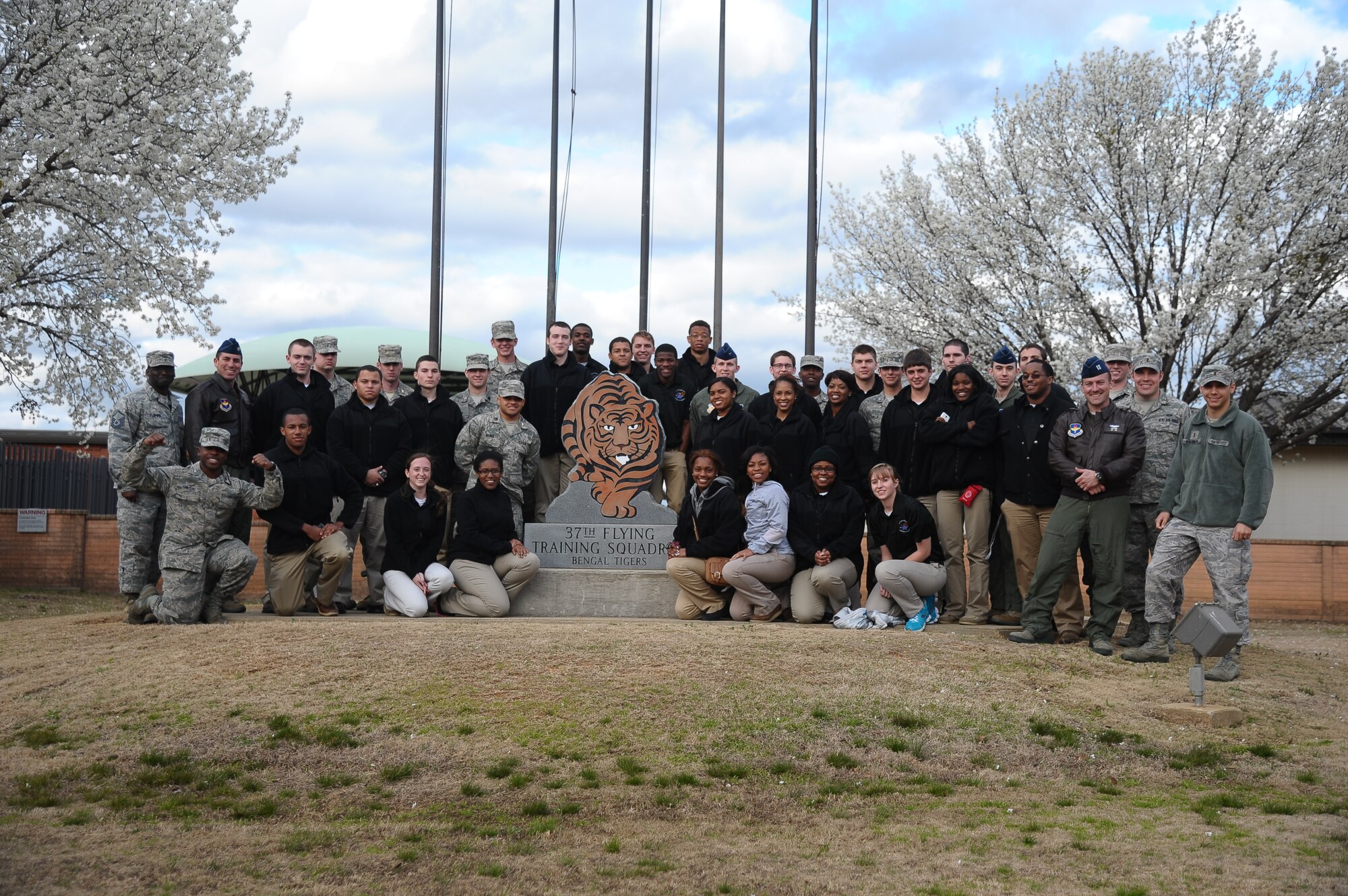 University of Memphis Reserve Officer Training Corps Students from Detachment 785 pause for a photo March 12 outside of the 37th Flying Training Squadron building. The students spent time learning about the different flying training squadrons located on Columbus Air Force Base on their tour. (U.S. Air Force Photo/Airman 1st Class Stephanie Englar)