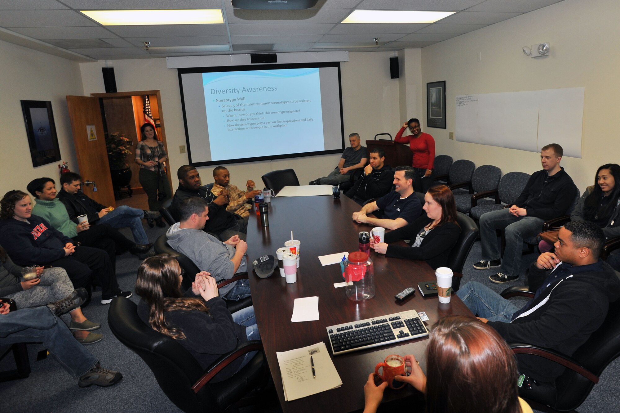 Members from the 92nd Comptroller Squadron and the 92nd Air Refueling Wing Public Affairs office have a diversity discussion during Wingman day March 7, 2014, at Fairchild Air Force Base, Wash. Fairchild AFB celebrates Wingman Day biannually to reinforce good Wingman behaviors and the four pillars of Comprehensive Airmen Fitness. (U.S. Air Force photo by Staff Sgt. Veronica Montes/Released)