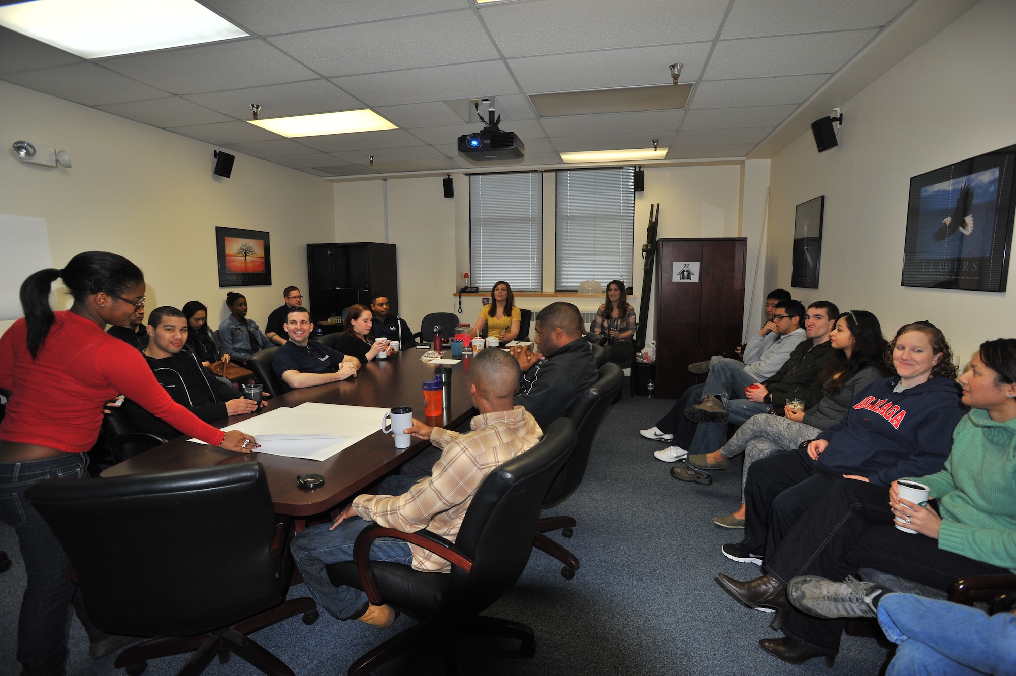 Members from the 92nd Comptroller Squadron and the 92nd Air Refueling Wing Public Affairs office have a diversity discussion during Wingman day March 7, 2014, at Fairchild Air Force Base, Wash. Fairchild AFB celebrates Wingman Day biannually to reinforce good Wingman behaviors and the four pillars of Comprehensive Airmen Fitness. (U.S. Air Force photo by Staff Sgt. Veronica Montes/Released)