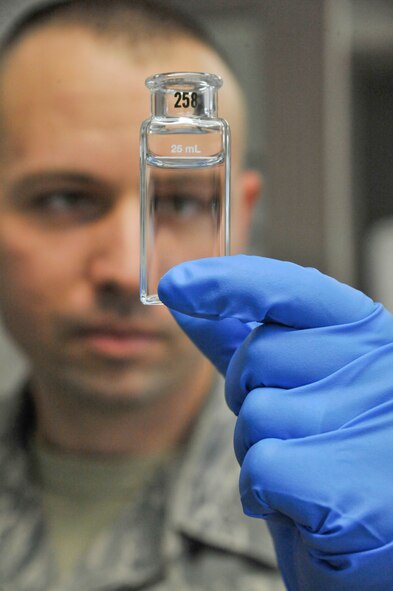 U.S. Air Force Senior Airman Brandon Lynn, 509th Civil Engineer Squadron water and fuels maintenance journeyman, performs a chlorine residual test at Whiteman Air Force Base, Mo., March 3, 2014. This procedure ensures chlorine residual is within the required ranges for achievable disinfection. (U.S. Air Force photo by Airman 1st Class Keenan Berry/ Released)