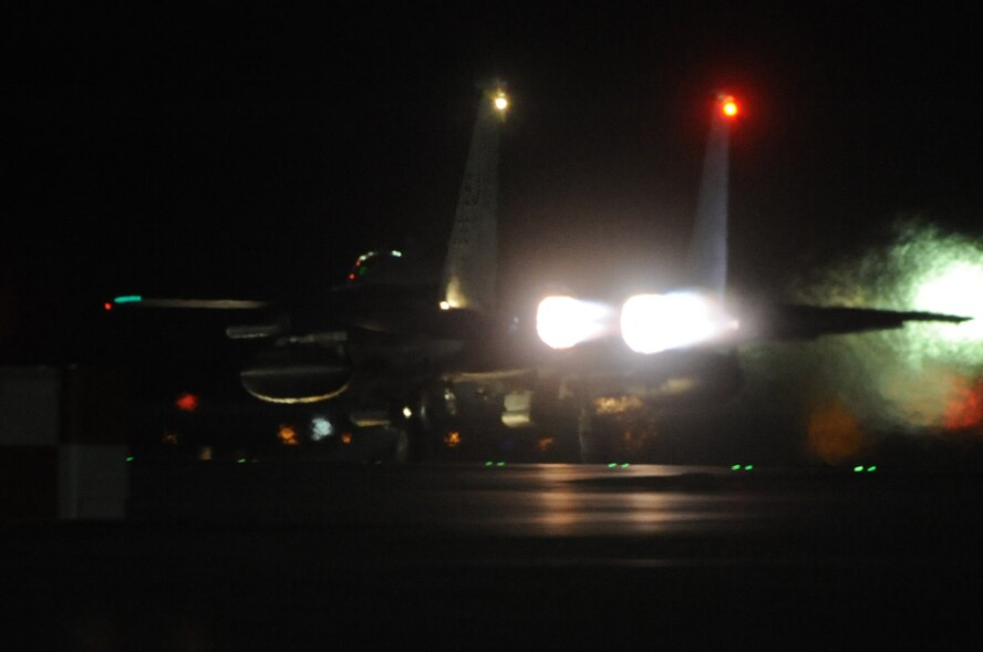 An F-15E Strike Eagle from the 336th Fighter Squadron, Seymour Johnson Air Force Base, N.C., takes off for a night operation during Red Flag 14-2 at Nellis Air Force Base, Nev., March 10, 2014. The 336th FS flew operations daily, as well as provided core staff personnel to accomplish the mission. (Air Force photo/Staff Sgt. Chuck Broadway)
