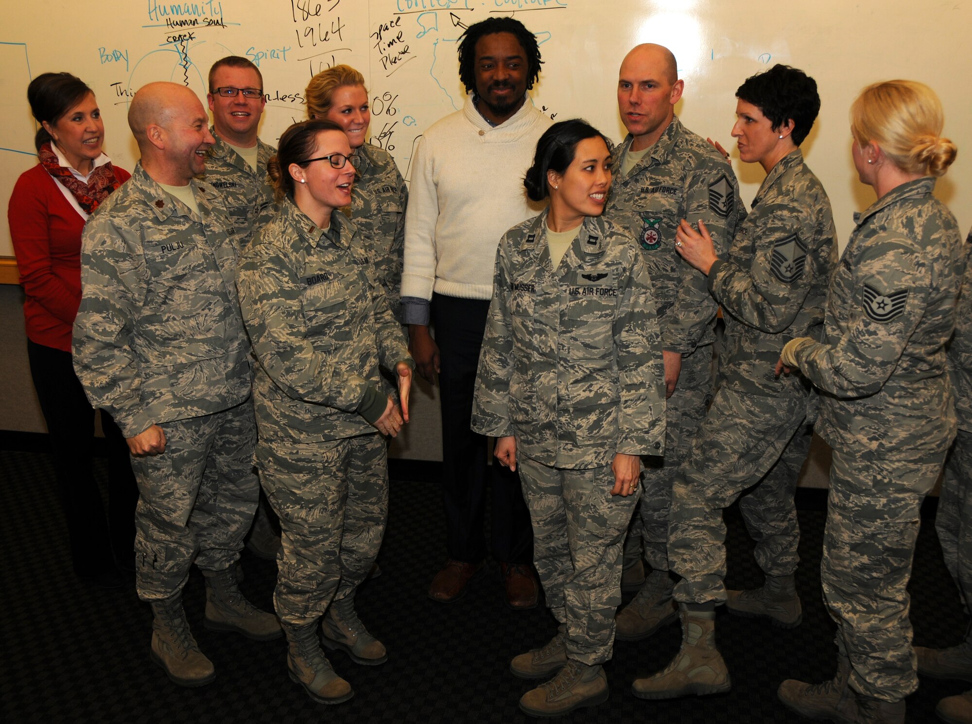 The 133rd Airlift Wing’s human resource advisor and Wing Culture Council, held a special brown bag lunch and guest speaker in St. Paul, Minn., Feb. 23, 2014. Airmen from the Wing gathered after to converse and laugh with the speaker, Andre Koen, about his informative and interactive discussion on developing cultural competencies. (U.S. Air National Guard photo by Senior Airman Kari Giles/Released)