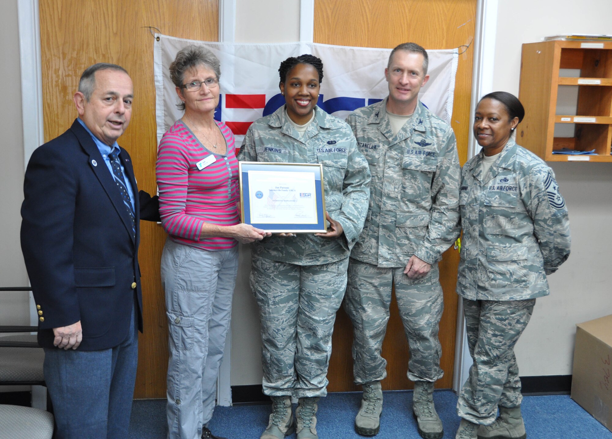 Members of the 315th Airlift Wing and ESGR presents Jan Parsons (center, left) from the Summerville, S.C. YMCA with the ESGR Patriot Award (Air Force Photo/Maj. Wayne Capps