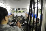 Inter-American Squadron Officer School students from Joint Base San Antonio-Lackland listen to a presentation in Spanish on the 359th Aerospace and Operational Physiology Training Unit’s altitude chamber at JBSA-Randolph.   The students were at JBSA-Randolph as part of an aircrew training immersion tour, March 11. The Inter-American Squadron Officer School is a professional military education course taught in Spanish to members of several Latin American federal agencies and U.S. Air Force captains. There are 17 students from the U.S., Colombia, Panama and Guatemala in this class. The school is part of the 37th Training Wing’s Inter-American Air Forces Academy. (U.S. Air Force photo by Airman 1st Class Alexandria Slade)