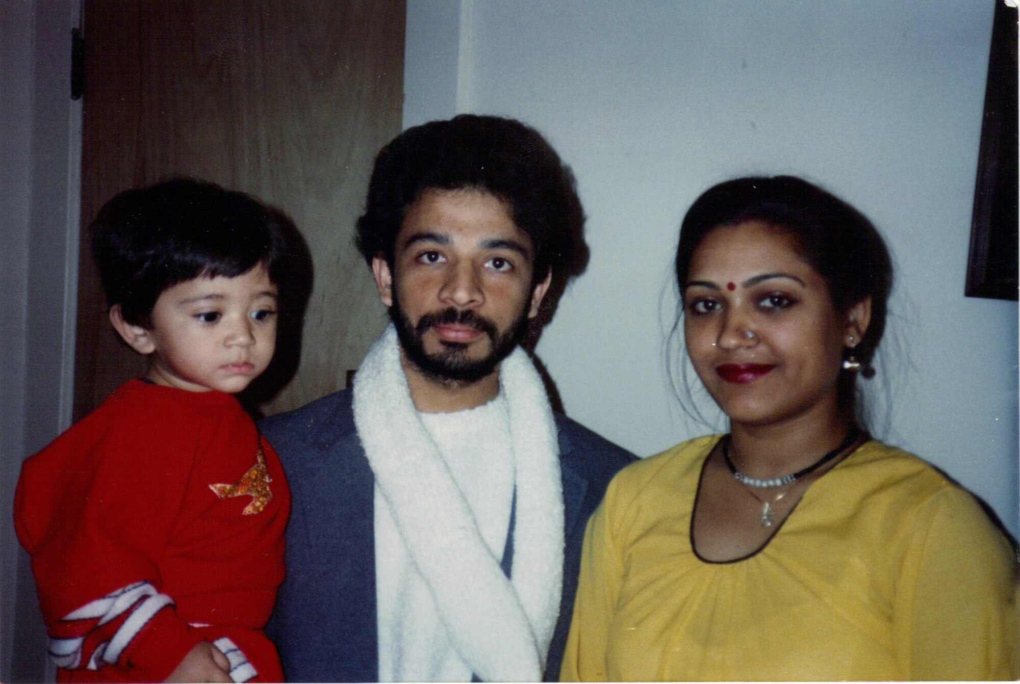 Lt. Col. Anoop Attreya is shown here with his family before joining the Air Force. Attreya grew up in northern India and is currently a member of the 375th Medical Group as the Public Health Flight commander. (U.S. Air Force photo/Airman 1st Class Kiana Brothers)