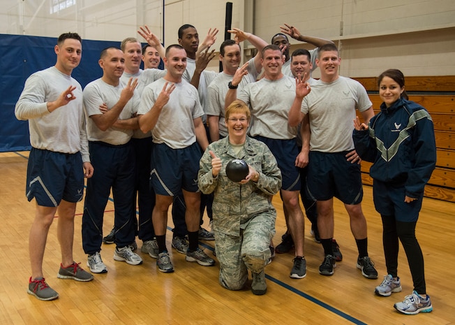 Airmen from the 628th Medical Group gather for a group photo after winning the Commander’s Dodgeball Challenge March 7, 2014, at the Fitness Center on Joint Base Charleston – Air Base, S.C. The monthly Commanders Challenge is a Wing initiative intended to encourage resident interaction and camaraderie as part of Comprehensive Airmen Fitness. (U.S. Air Force photo/ Airman 1st Class Clayton Cupit)