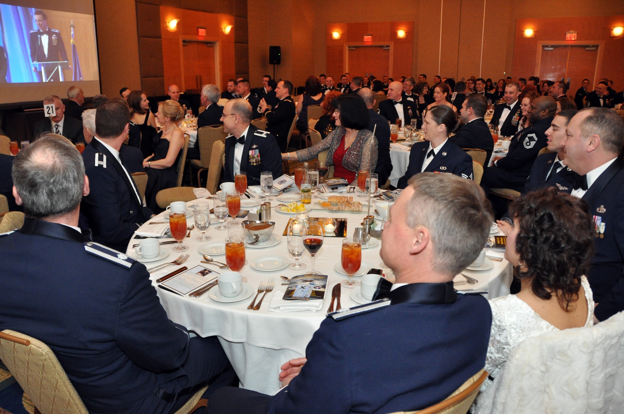 Guests of the Pittsburgh International Airport Air Reserve Station’s Annual Awards Banquet listen to the opening remarks of the ceremony from Vice Wing Commander, Col.  Jeffery S. Kozak, at the Hyatt Regency Pittsburgh International Airport, March 1, 2014. Kozak briefed the audience on the significance of the evening and recognized the hard work of the Airmen of the 911th Airlift Wing. Guest speaker for the evening was retired Chief Master Sgt. of the Air Force, Robert D. Gaylor. Gaylor was the 5th Chief Master Sergeant of the Air Force and held the office from 1977 to 1979, before retiring. (U.S. Air Force photo by Senior Airman Joseph E. Bridge)