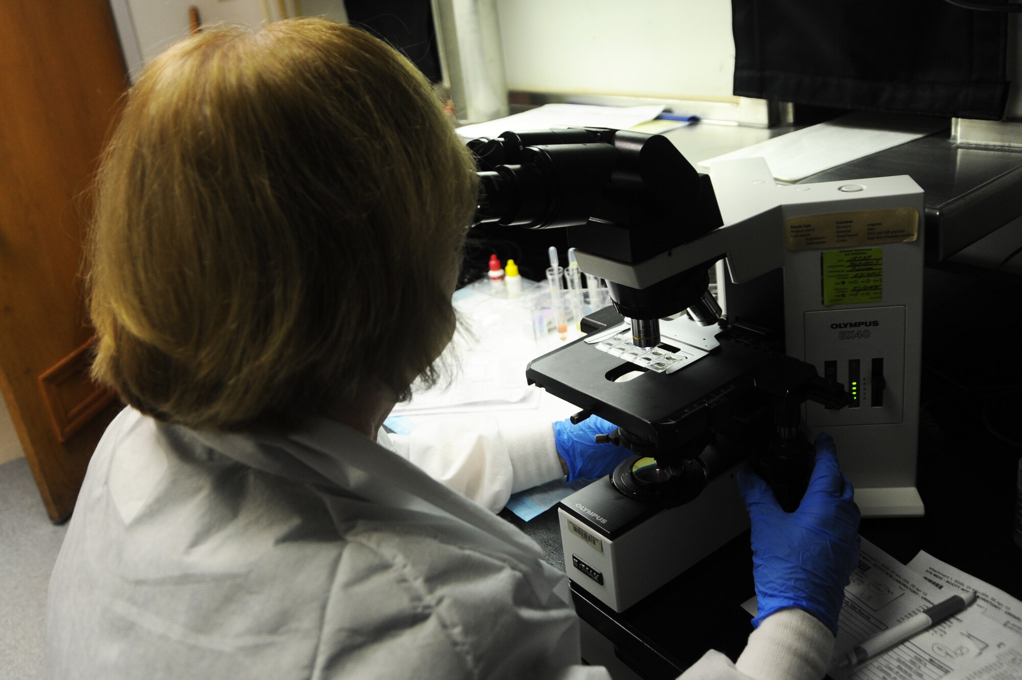 Scott Air Force Base technicians analyze medical samples in the laboratory. (U.S. Air Force photo/Airman 1st Class Megan Friedl)