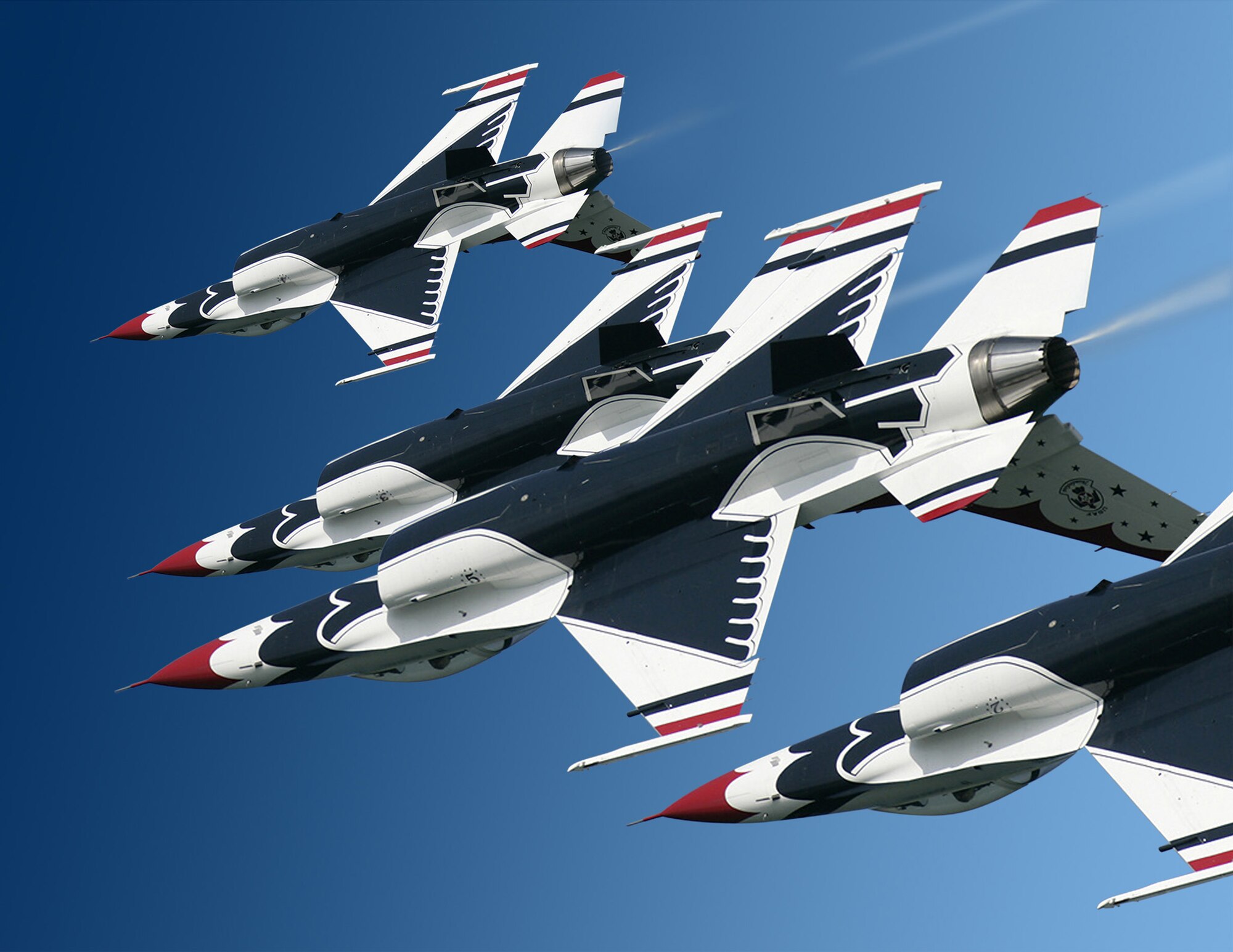 The U.S. Air Force Thunderbirds practice aerial maneuvers above Nellis Air Force Base, Nev.   The Air Force's premier flying team will headline SkyFest 2014 May 31 and June 1 .  (Courtesy photo)
