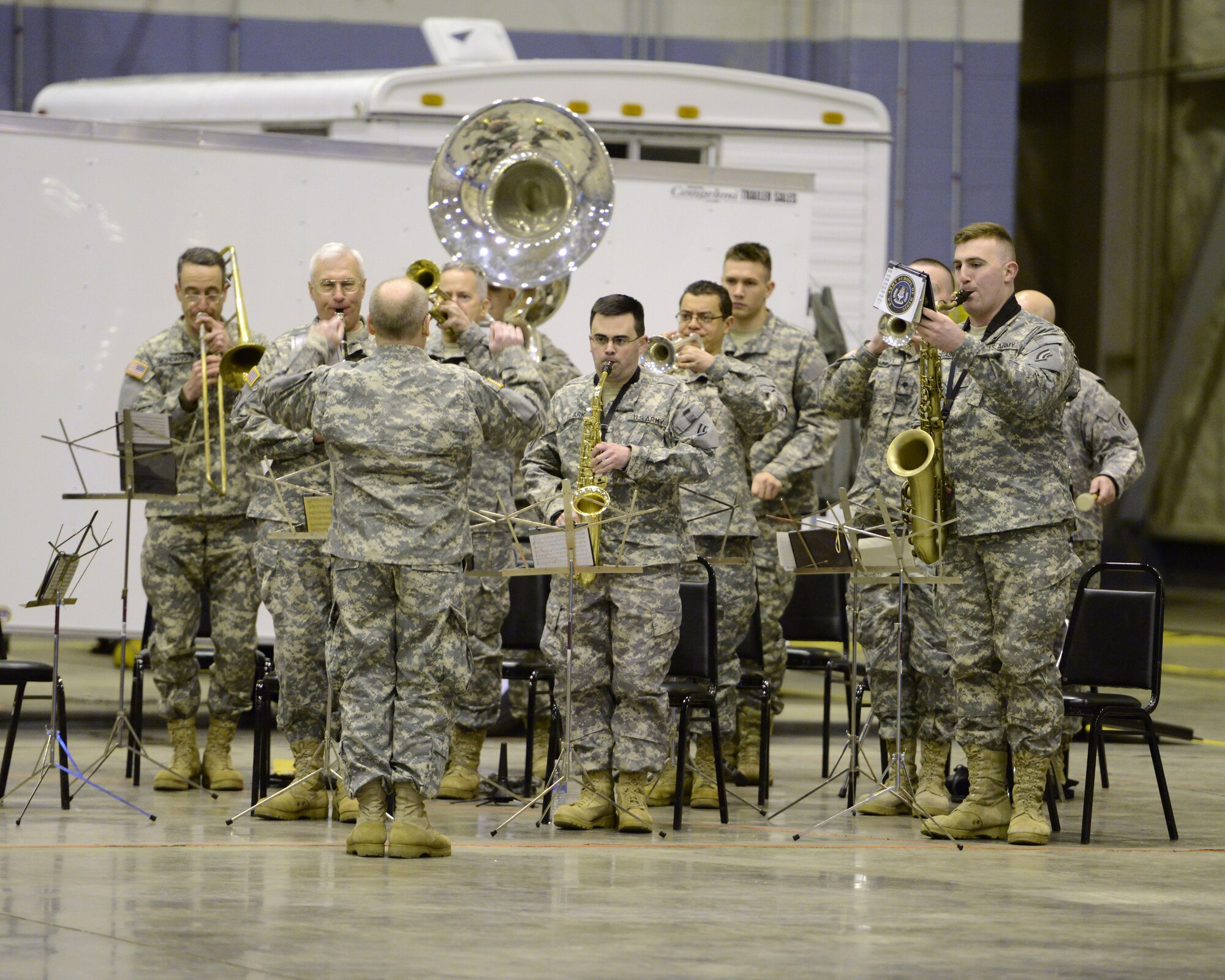 U.S. Army Soldiers with the 42nd Infantry Division Band, New York National Guard, supporting a pre-deployment ceremony for the 1569th Transportation Company, New York Army National Guard conducted in a hangar at the 105th Airlift Wing, March 9, 2014.  (U.S. Air National Guard photo by Tech. Sgt. Michael OHalloran/Released)