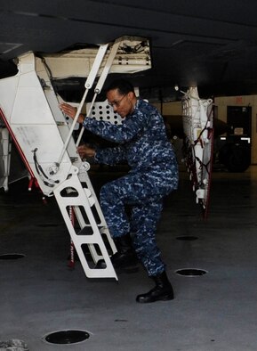 U.S. Navy Adm. Cecil D. Haney, commander of U.S. Strategic Command, climbs the ladder for a tour of the B-2 Spirit cockpit during his visit to Whiteman Air Force Base, Mo., March 10, 2014. The 509th Bomb Wing supports USSTRATCOM’s strategic deterrence mission by operating and maintaining B-2 Spirit bombers to deter strategic threats from adversaries and assure our allies of our commitment to their security. (U.S. Air Force photo by Staff Sgt. Alexandra M. Boutte/Released)