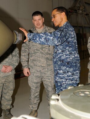 U.S. Air Force Master Sgt. Cory Wenger, 509th Aircraft Maintenance Squadron section chief, explains the specifics of a conventional weapon to U.S. Navy Adm. Cecil D. Haney, commander of U.S. Strategic Command, at Whiteman Air Force Base, Mo., March 10, 2014. USSTRATCOM relies on various task forces for the execution of its global missions, including space operations, information operations, missile defense, global command and control, intelligence, surveillance and reconnaissance, global strike and strategic deterrence and combating weapons of mass destruction. (U.S. Air Force photo by Staff Sgt. Alexandra M. Boutte/Released)