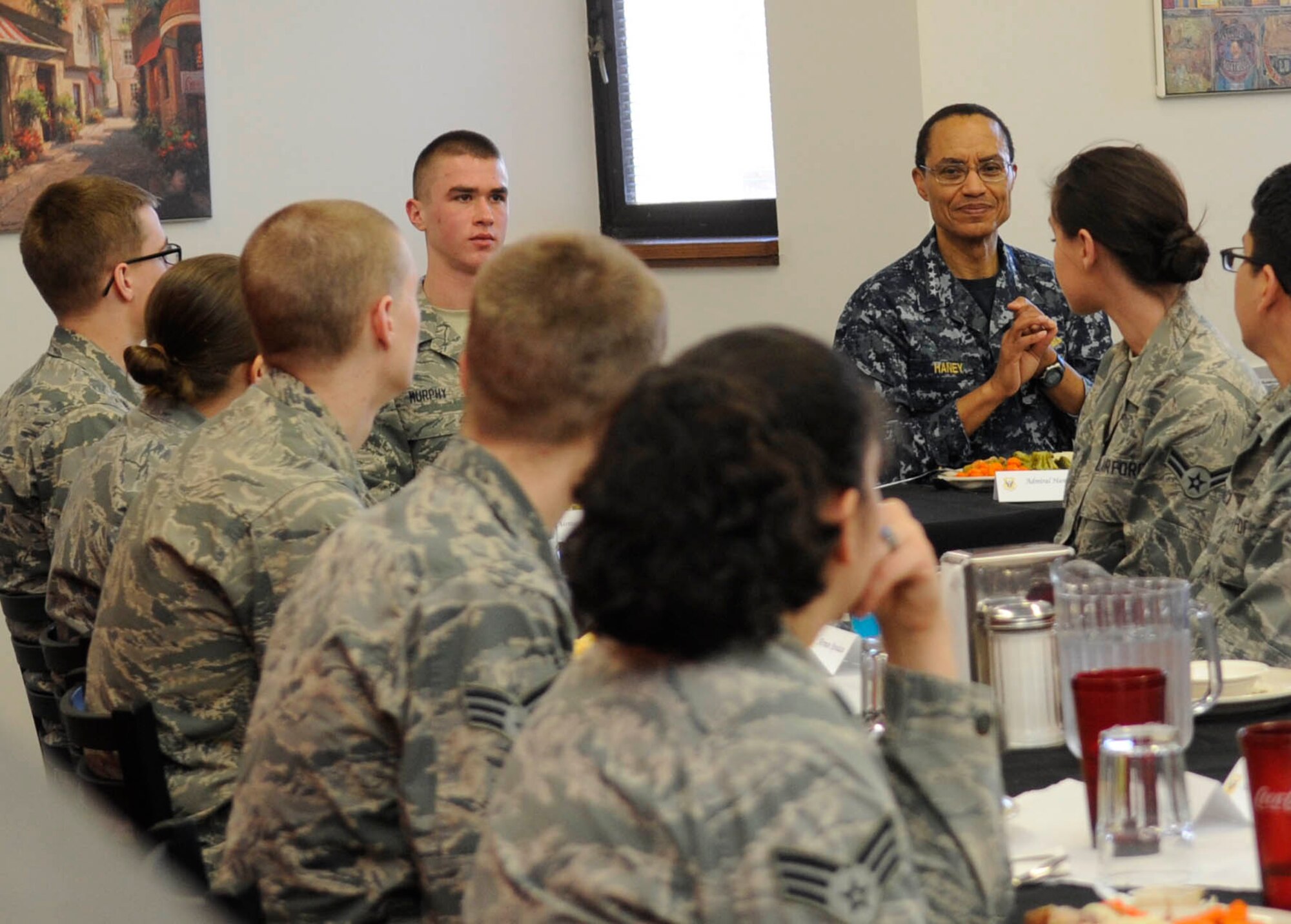 U.S. Navy Adm. Cecil D. Haney, commander of U.S. Strategic Command, talks with junior enlisted Airmen during a lunch at the Ozark Inn Dining Facility, Whiteman Air Force Base, Mo., March 10, 2014. Haney asked Airmen about their concerns and ideas for improving working and living conditions and stressed the importance of their contributions to our nation’s nuclear deterrence mission. (U.S. Air Force photo by Staff Sgt. Alexandra M. Boutte/Released)