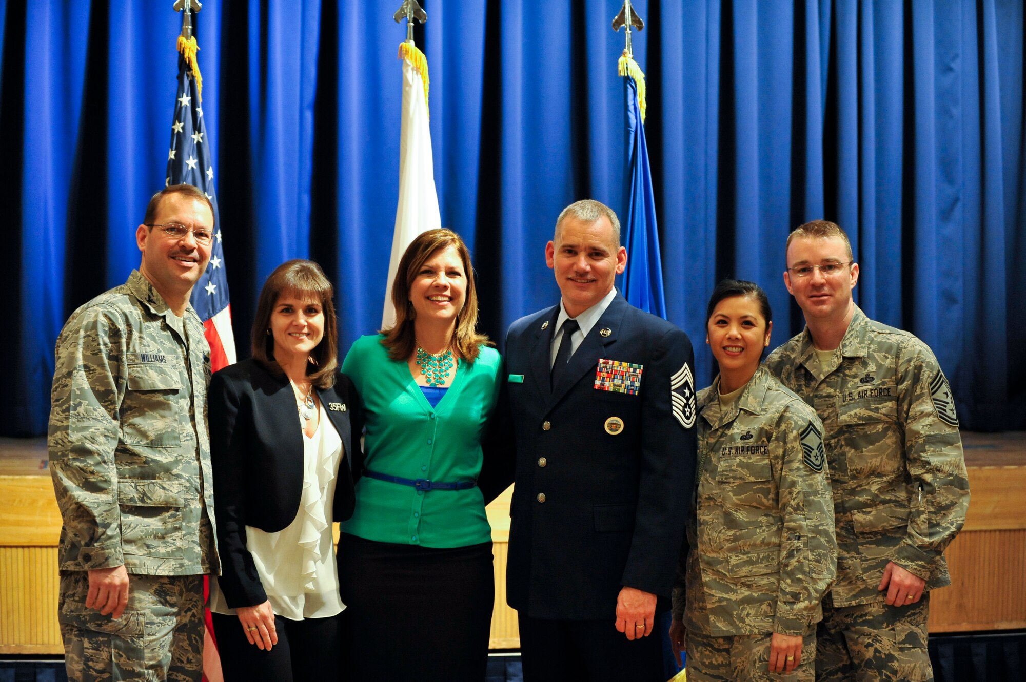 From left: U.S. Air Force Col. Stephen Williams, 35th Fighter Wing commander, and his wife, Holly, stand alongside Terri Laurent and Chief Master Sgt. James Laurent, United States Forces Japan and 5th Air Force Command Chief Master Sgt., and Senior Master Sgt. Irene Sharp, 373rd Support Squadron Superintendant, and 35 FW Command Chief Master Sgt. Gary Sharp after a National Prayer Luncheon at Misawa Air Base, Japan, March 12, 2014. James Laurent served as the key guest speaker for the luncheon and previously served as the 35 FW Command Chief from January 2012 to May 2013. (U.S. Air Force photo/Airman 1st Class Patrick S. Ciccarone)