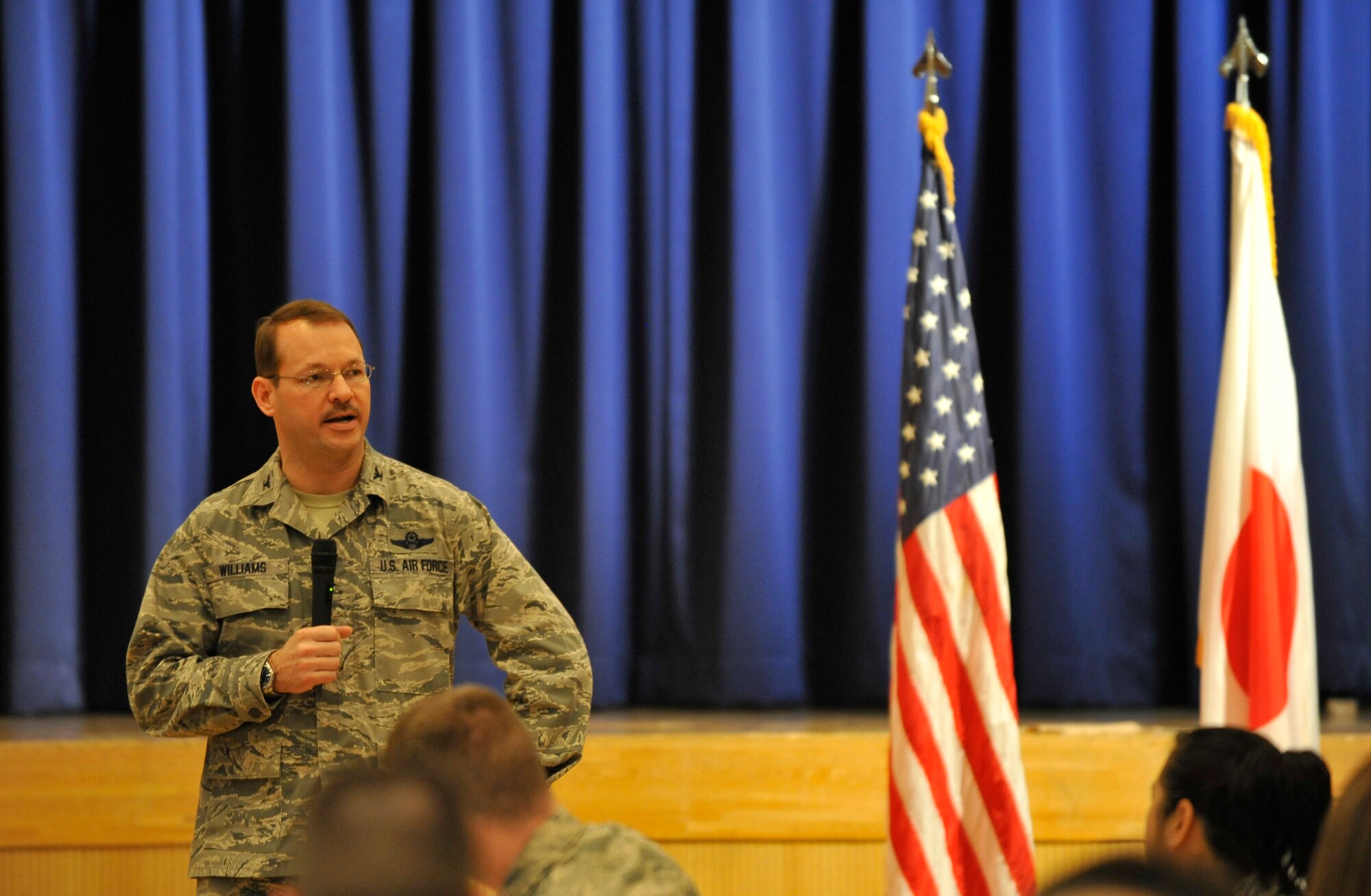 U.S. Air Force Col. Stephen Williams, 35th Fighter Wing commander, shares closing thoughts during a National Prayer Luncheon at Misawa Air Base, Japan, March 12, 2014. Williams expressed his gratitude to luncheon attendees and the community for their support and respect of religious freedoms. (U.S. Air Force photo/Airman 1st Class Patrick S. Ciccarone)