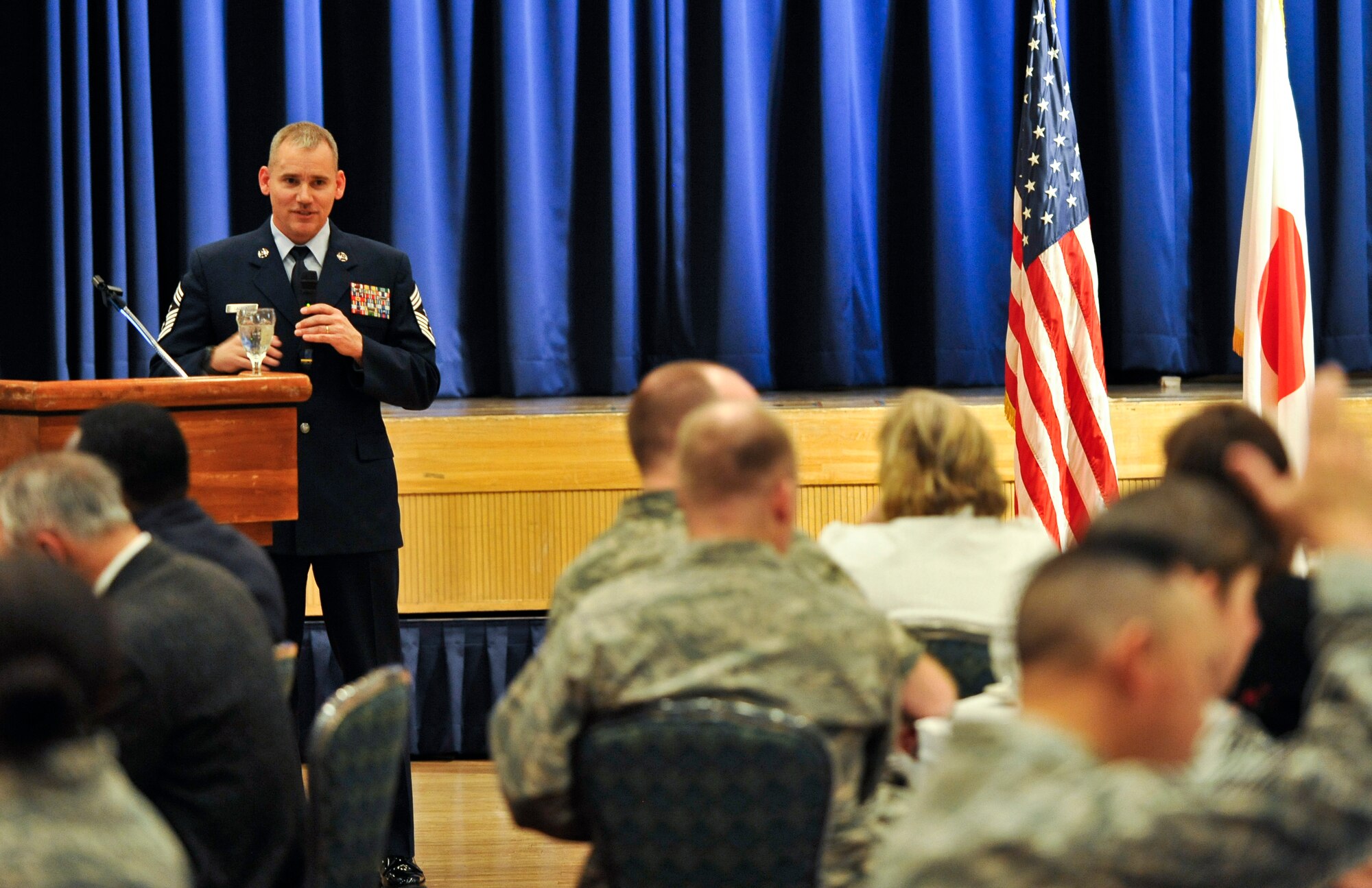 U.S. Air Force Chief Master Sgt.  James Laurent, United States Forces Japan and 5th Air Force Command Chief Master Sgt., speaks during a National Prayer Luncheon at Misawa Air Base, Japan, March 12, 2014. Laurent spoke to attendees about the importance of hope, prayer, unity and of his experiences at Misawa. Laurent previously served as the 35 FW Command Chief from January 2012 to May 2013. (U.S. Air Force photo/Senior Airman Derek VanHorn)