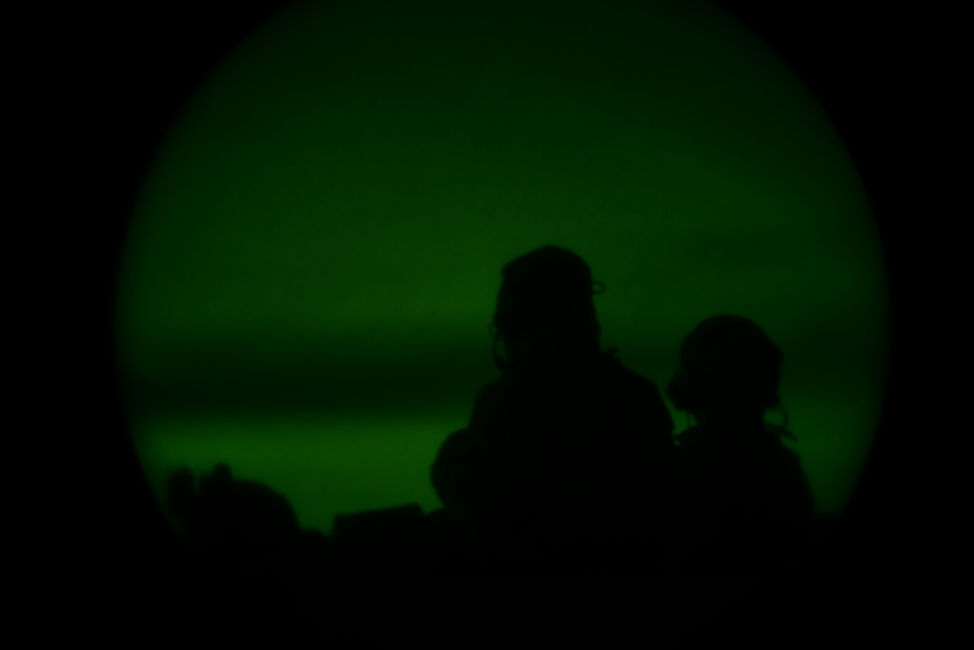 Two Air Force combat controllers call in an air strike on an exercise target at the Saylor Creek range March 11, 2014. Operations out of Mountain Home AFB will be increased throughout the week of March 10-14 due to the combat exercise Gunighter Flag. The exercise is designed to prepare multiple joint and coalition terminal attack controller teams for upcoming deployments as well as provide proficiency training for aircrews. (U.S. Air Force photo by Senior Airman Benjamin Sutton/Released)