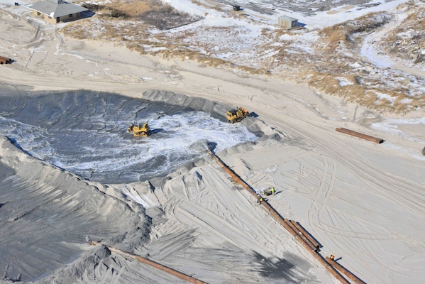 In addition to restoring the federal channel to authorized dimensions, the sand removed from Jones Inlet was beneficially re-used to provide a degree of shore protection along the 3,500 feet of shoreline ─ about 2/3 mile ─ immediately west of the inlet at Point Lookout and to provide emergency stockpiles for resiliency against future storm impacts, as needed.  