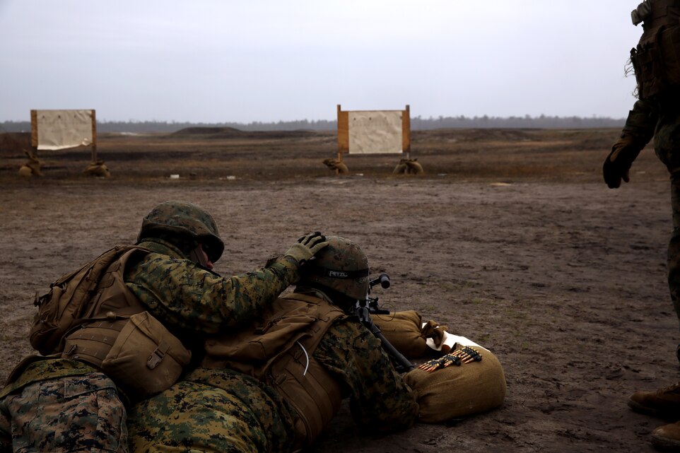 Lance Cpl. Alex R. Vieira fires an M-240B machine gun during a two-day field exercise at Marine Corps Base Camp Lejeune, March 6, 2014. Vieira is a gunner with Battery B, 2nd Low Altitude Air Defense Battalion.