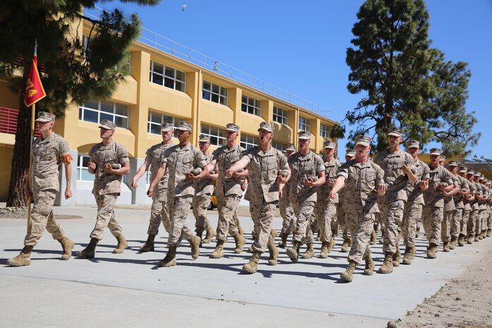 Recruits of Platoon 3214, Company I, 3rd Recruit Training Battalion, march with their sleeves rolled up. Rolled sleeves bring back some of the old traditions of the Marine Corps.
