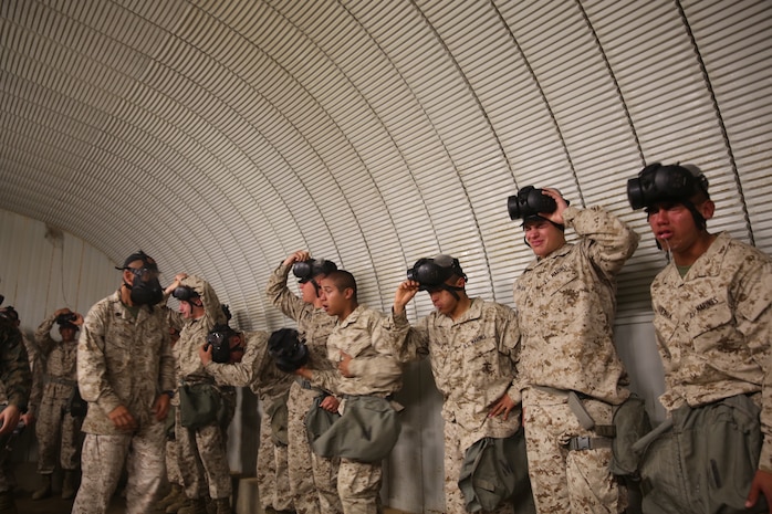 Marines of Company I, 3rd Recruit Training Battalion, feel the effects of chlorobenzylidene malonitrile, or CS gas, for the first time during the Confidence Chamber at Edson Range aboard Marine Corps Base Camp Pendleton, March 3.  The gas is a non-lethal tear gas and also a riot control agent.