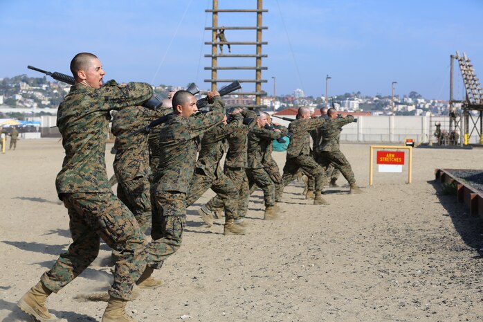 Recruits of Company M, 3rd Recruit Training Battalion, practice their Marine Corps Martial Arts Program techniques while waiting to move on to the next obstacle during the Confidence Course aboard the depot,Feb. 25. Every minute during the event was utilized for training. When recruits weren’t on an obstacle, they were practicing MCMAP, or combat first aid as they waited for others in their group to finish the obstacle before moving on to the next event.