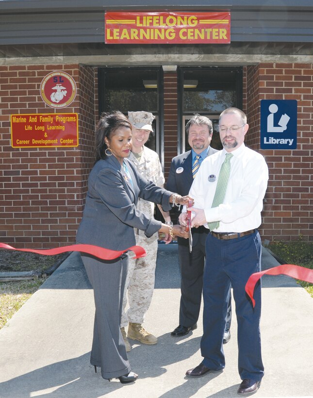 Marine Corps Logistics Base Albany officials conduct a ribbon cutting ceremony for the Lifelong Learning and Career Development Center, here, March 10. The facility accommodates education services, information and referral services, personal financial management, retired activities and transition assistance, to name a few. These services are provided as part of MCLB Albany’s Marine and Family Programs.
