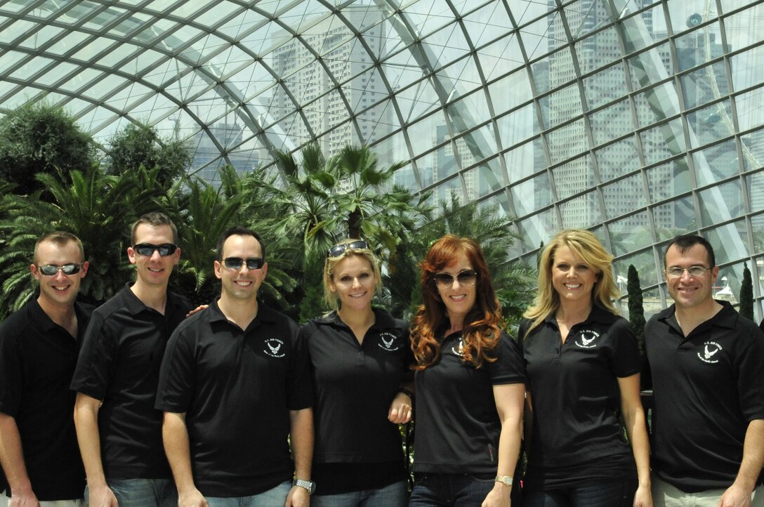 CHANGI, Singapore-- "Hana Hou!' takes another group photo in the Flower Dome at the Gardens By the Bay, Feb. 13, 2014. The group played 9 shows to over 100K audience members throughout their tour. The Band of the Pacific-Hawaii went to Singapore in support of the air show, the U.S. Embassy, and to improve international relations. (US Air Force Photo/ SrA Andy Detra/released)