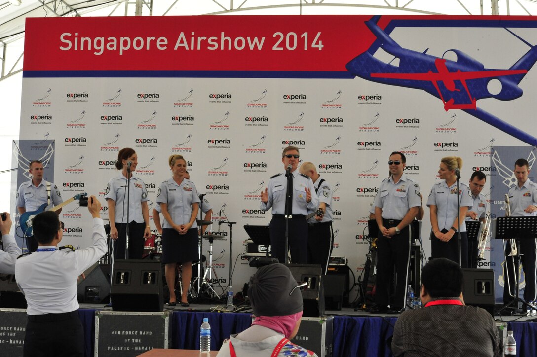 CHANGI, Singapore-- The PACAF Commander, General Carlisle, addressed the crowd at the Singapore Air Show, Feb. 12, 2014.The group played 9 shows to over 100K audience members throughout their tour. The Band of the Pacific-Hawaii went to Singapore in support of the air show, the U.S. Embassy, and to improve international relations. (US Air Force Photo/ SrA Andy Detra/released)
