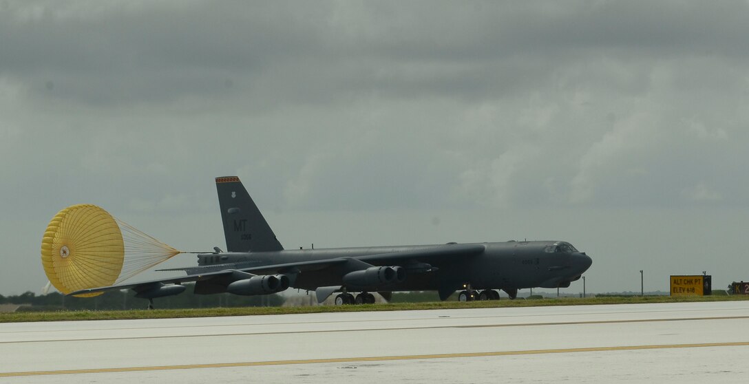 A B-52H Stratofortress aircrew from Minot Air Force Base, N.D., lands on Andersen Air Force Base, Guam after completing a mission March 11, 2014. The Airmen with the 69th Expeditionary Bomb Squadron deployed with the B-52s as part of the continuous bomber presence mission to maintain a prudent, long-standing deterrent capability throughout the Asia-Pacific region. (U.S. Air Force photo by Airman 1st Class Emily A. Bradley/Released)
