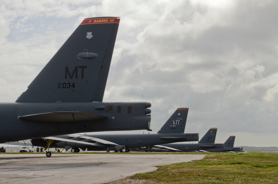 B-52H Stratofortresses from Minot Air Force Base, N.D., are parked on the flightline on Andersen Air Force Base, Guam, March 11, 2014. The Airmen with the 69th Expeditionary Bomb Squadron deployed with the B-52s as part of the continuous bomber presence mission to maintain a prudent, long-standing deterrent capability throughout the Asia-Pacific region. (U.S. Air Force photo by Airman 1st Class Emily A. Bradley/Released)