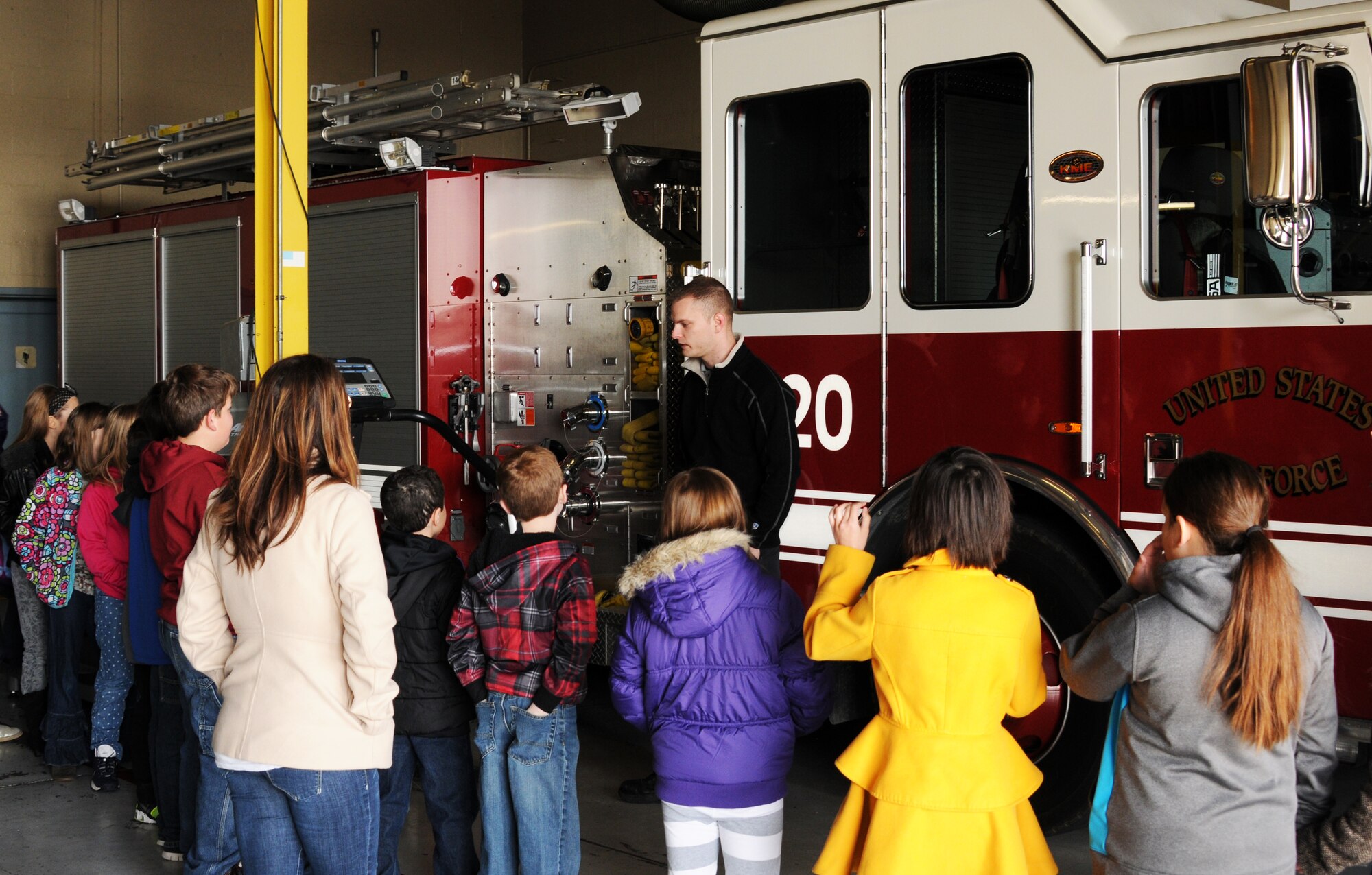 Fort Smith Union Christian Academy tours the 188th Fighter Wing March 5, 2014, as part of the unit’s community outreach and base tour program. Students in grades 1st-4th toured the 188th’s hangar, Fire Emergency Services Office and Security Forces Squadron during their visit. (U.S. Air National Guard photo by Tech. Sgt. Josh Lewis/released)