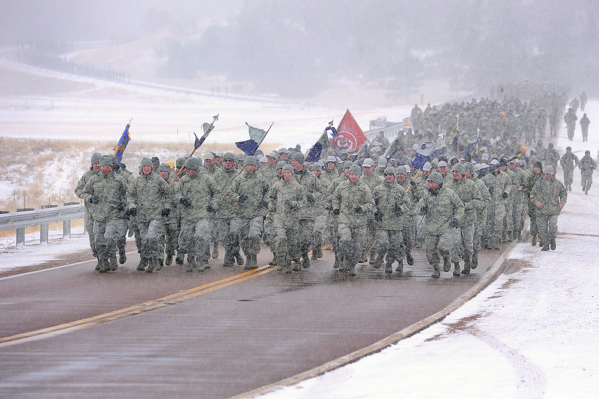 Class of 2016 cadets brave freezing temperatures and snow on their “Run to the Rock,” March 9, 2013. The run is an annual Academy tradition heralding the start of Recognition for freshman cadets. (U.S. Air Force Photo/Sarah Chambers)