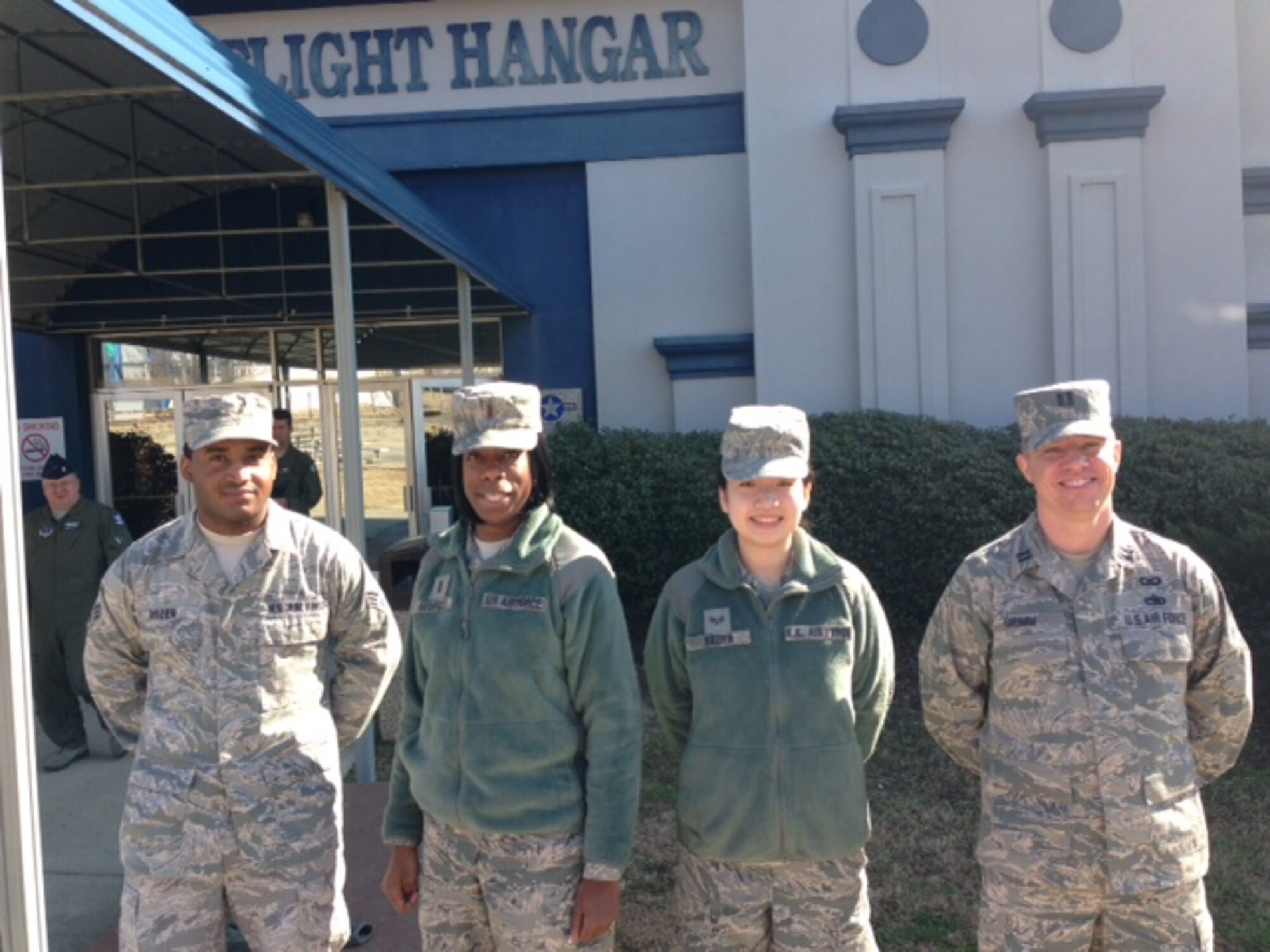 U.S. Air Force Senior Airman James Rozier, 2nd. Lt. Cicely Georges, Senior Airman Jessica Rozier and Capt. Eli Grimm from 117th Air Control Squadron, Georgia Air National Guard attend the Hometown Heroes ceremony, Mar. 9, 2014 at the Museum of Aviation in Warner-Robins, GA.