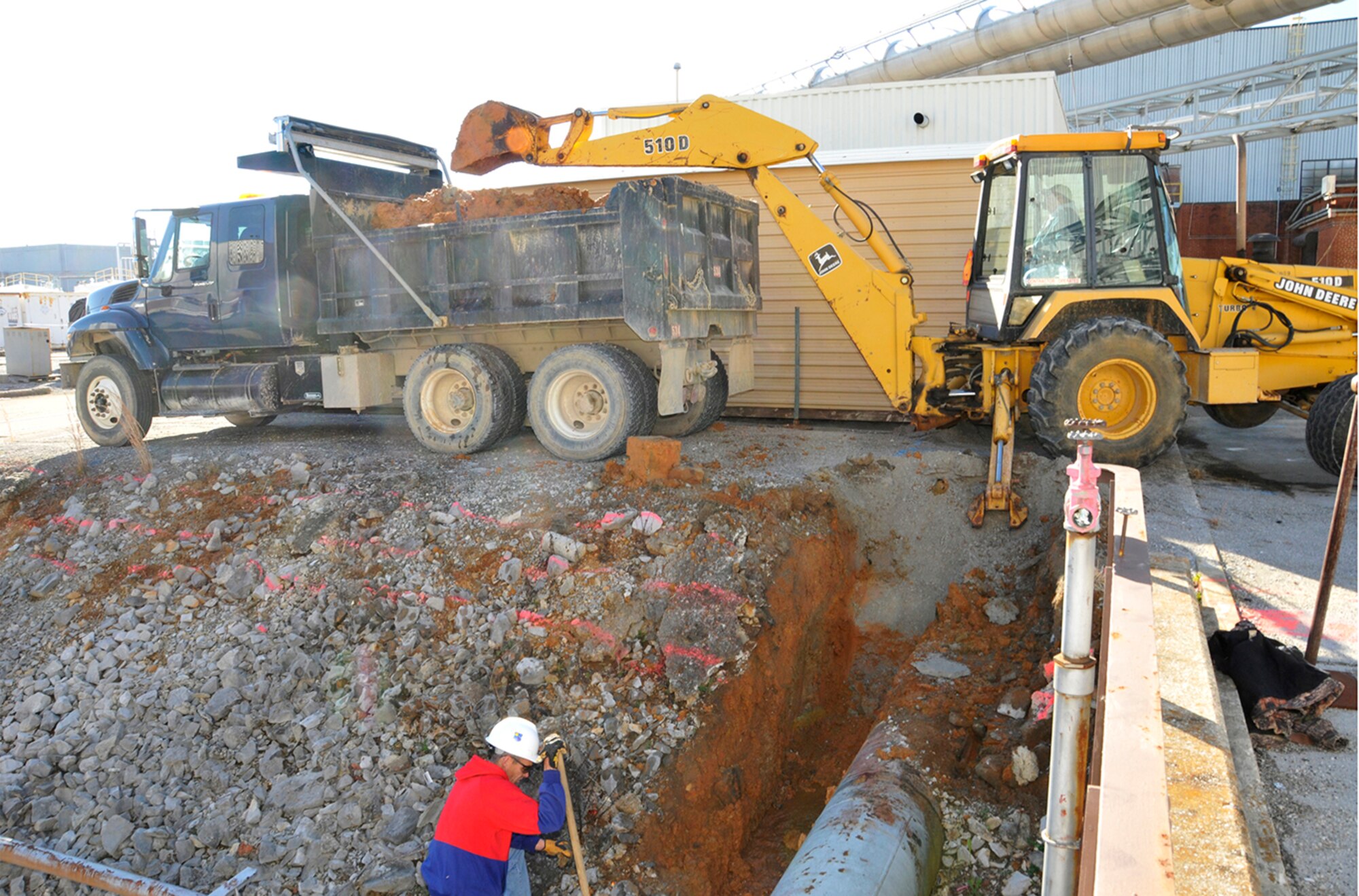 An Arnold Engineering Development Complex employee begins work on some of the lines at the Complex after recent bad weather. (Photo by Rick Goodfriend)