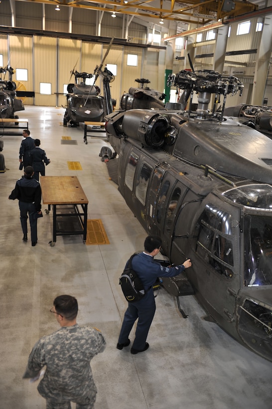 Canadian Air Cadets from the 180th Mosquito Squadron tour UH-60 Black Hawk maintenance trainers at Fort Eustis, Va., March 12, 2014. The mission of the Canadian Air Cadet program is to bring military ethos to youth and develop citizenship and sports. Many of the 180th Mosquito Squadron cadets are seeking a career in aviation. (U.S. Air Force photo by Staff Sgt. Katie Gar Ward/Released)