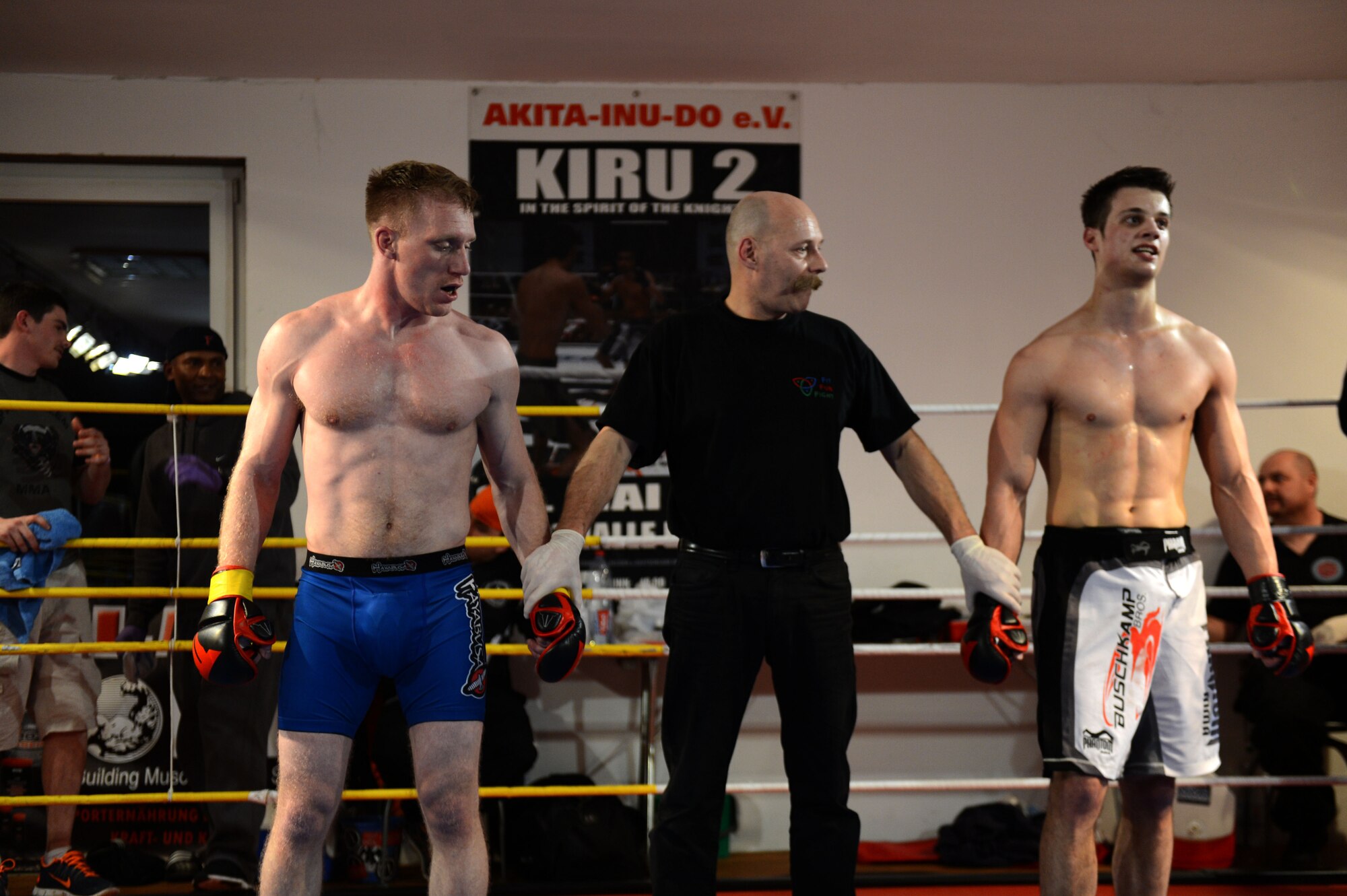 U.S. Air Force Senior Airman Sean Whitaker, a Spangdahlem mixed martial arts member from Pittsburgh, awaits the official decision of a fight during an MMA tournament in Pruem, Germany, March 8, 2014. Whitaker lost the fight by a triangle choke submission in the second round. (U.S. Air Force photo by Senior Airman Gustavo Castillo/Released) 