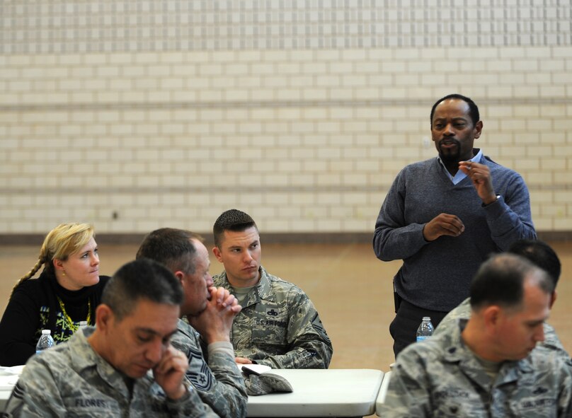 Ron Hooks, Air Force Aid Society officer, speaks to Airmen during the Air Force Assistance Fund kick-off luncheon March 3, 2014, at Dyess Air Force Base, Texas. The AFAF program helps active duty, retired members and their dependents by offering interest free loans, grants and other avenues when faced with financial hardships. Air National Guard and Air Force Reservists are also eligible for assistance when serving on extended active duty over 15 days. (U.S. Air Force photo by Airman 1st Class Kedesha Pennant/Released)