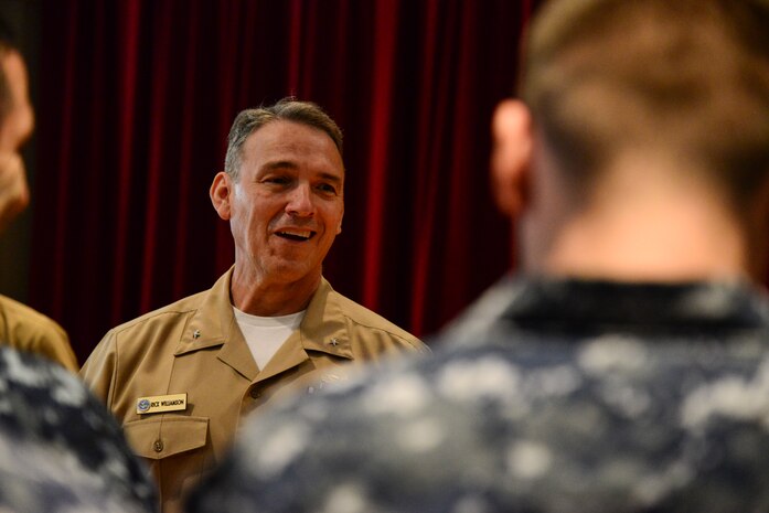 Rear Adm. Rick Williamson, Commander, Navy Region Southeast, chats with Sailors after an award ceremony March 11, 2014 at the Redbank Club on Joint Base Charleston - Weapons Station, S.C. Williamson recently assumed command of NSRE and made the trip to Charleston, along with members of his staff, to learn about the benefits of joint basing and to chat with Sailors and their leadership. (U.S. Air Force photo/ Airman 1st Class Clayton Cupit)