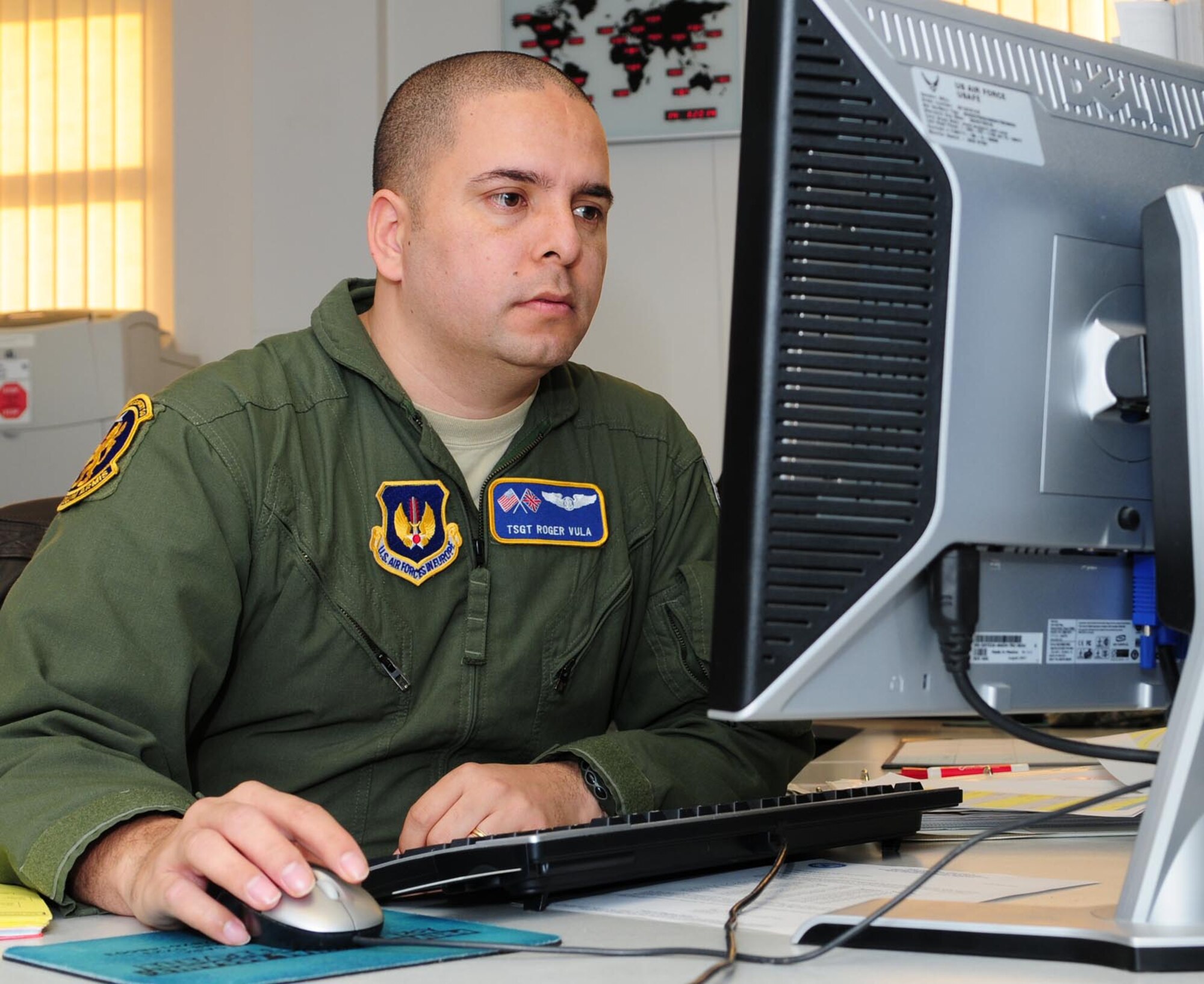 U.S. Air Force Tech. Sgt. Roger Vula, 100th Operations Support Squadron boom operator and NCO in charge of wing scheduling current operations, coordinates the fuel load, takeoff and land time of a KC-135 Stratotanker Jan. 14, 2014, on RAF Mildenhall, England. This is just one of the many different aspects of coordination the wing schedulers perform, to ensure the maintainers know when a jet is ready, and they have personnel ready to service it. In fiscal year 2013, the 100th Air Refueling Wing carried out 8,350 flying hours with 1,530 sorties, enabling the wing to offload 58 million pounds of fuel to more than 5,500 receivers from the U.S., NATO and other coalition forces. (U.S. Air Force photo by Karen Abeyasekere/Released)