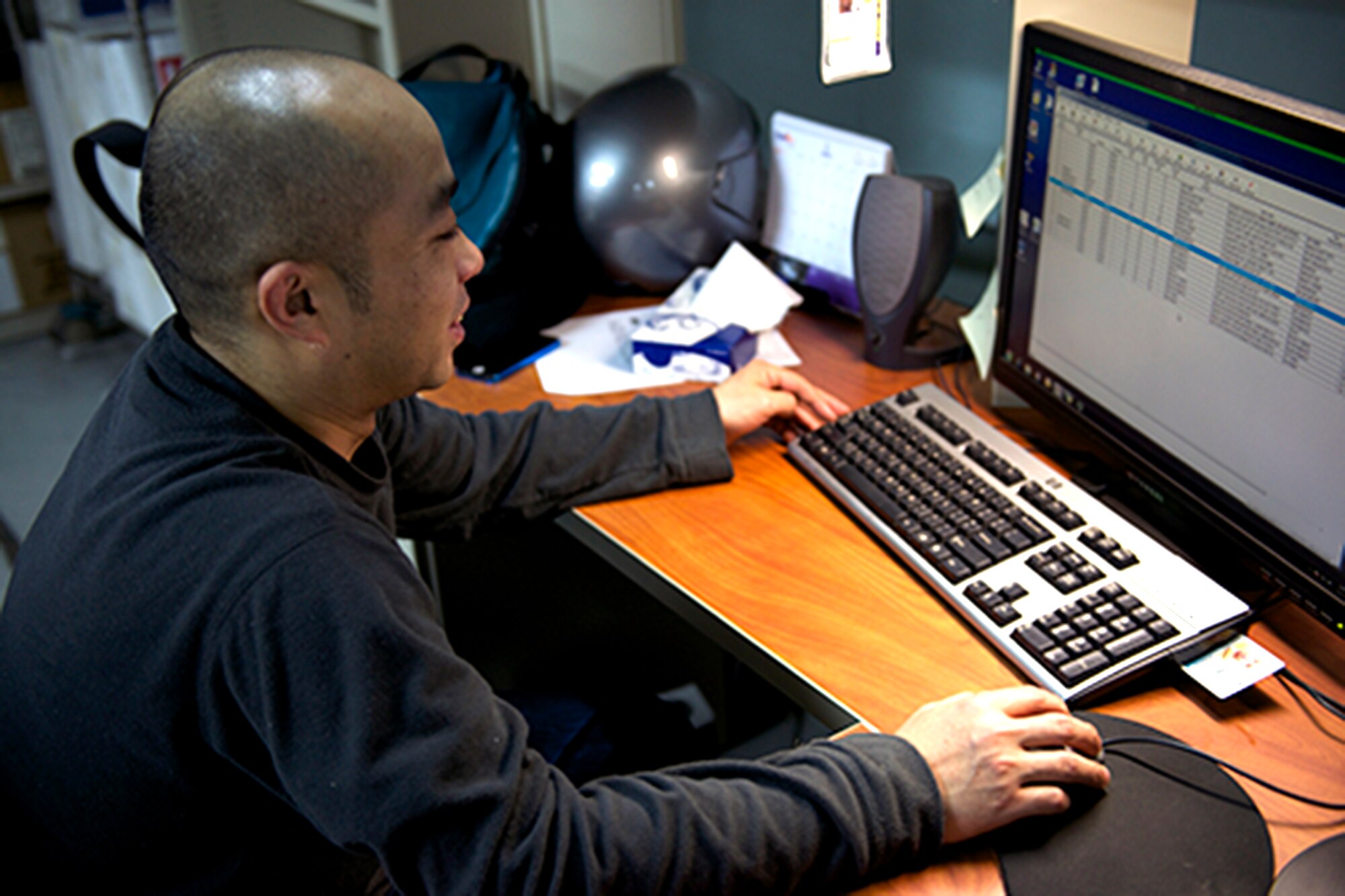 Nobuhiro Yamaoka, 374th Medical Support Squadron warehouseman, tracks an order with the Defense Medical Logistics Standard Support (DMLSS) automated information system at Yokota Air Base, Japan, March 13, 2014. The DMLSS provides a continuum of medical logistics support for the Defense Health Agency. (U.S. Air Force photo by Airman 1st Class David Danford/Released)