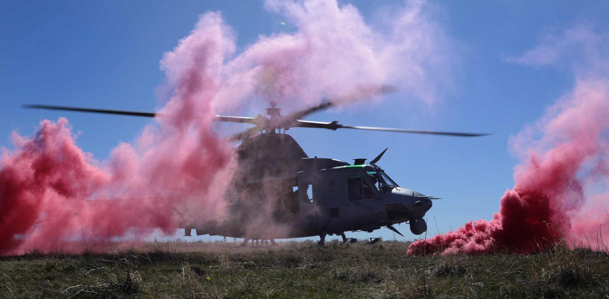 Members of the U.S. Marine Corps land a UH-1Y Venom during the Gunfighter Flag at the Juniper Butte Range at Mountain Home Air Force Base, Idaho, March 13, 2014. Members from the U.S Air Force, Marine Corps, Navy and the British Army will utilize the range complexes during the week-long exercise. (U.S. Air Force photo by Senior Airman Caitlin Guinazu/RELEASED) 