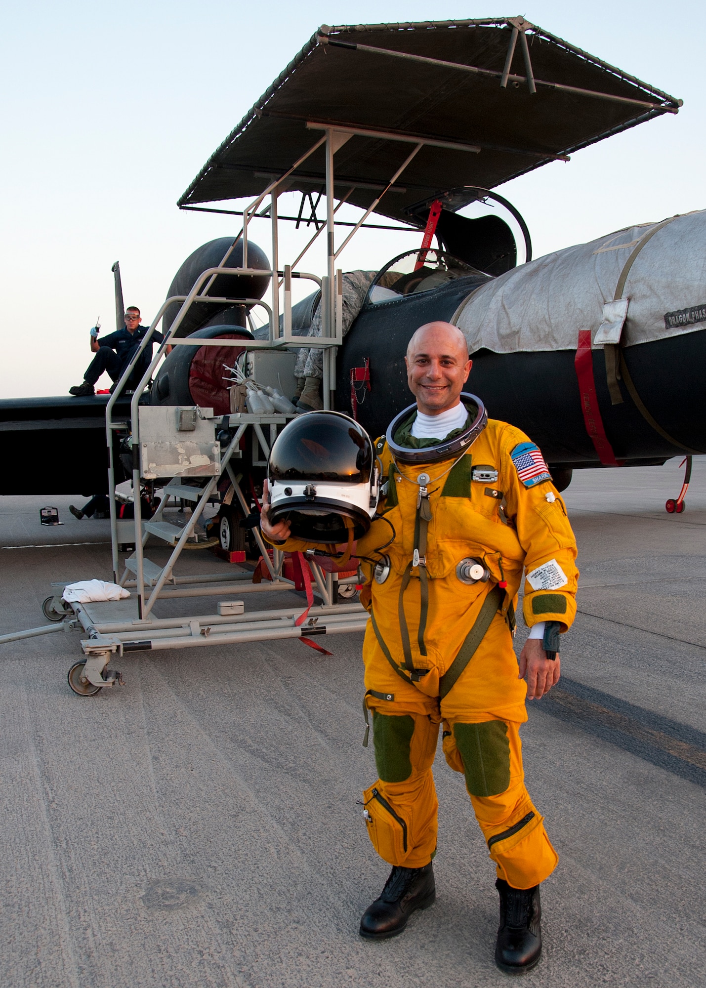 Air Force Maj. Ralph Shoukry, a pilot and tactics and employment lead assigned to the 99th Expeditionary Reconnaissance Squadron, poses for a photo in front of a U-2 Dragonlady at an undisclosed location in Southwest Asia, March 6, 2014. Shoukry just passed more than 1,000 combat flying hours. (U.S. Air Force photo by Staff Sgt. Michael Means/Released)