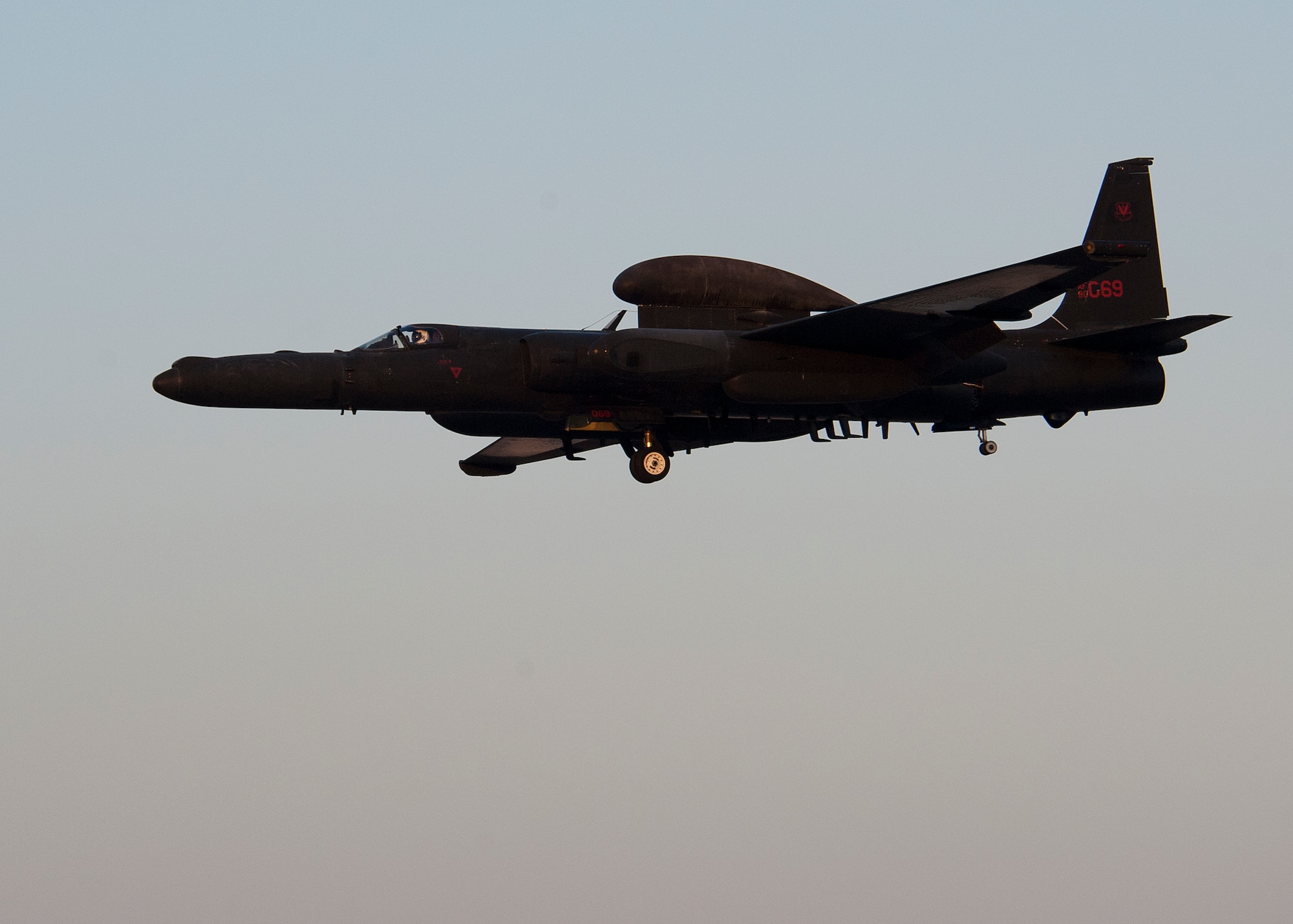 Air Force Maj. Ralph Shoukry, a pilot and tactics and employment lead assigned to the 99th Expeditionary Reconnaissance Squadron, flies a U-2 Dragonlady in for landing at an undisclosed location in Southwest Asia, March 6, 2014. Shoukry is a native of Monterey, Calif., and deployed here from Beale Air Force Base, Calif. (U.S. Air Force photo by Staff Sgt. Michael Means/Released)