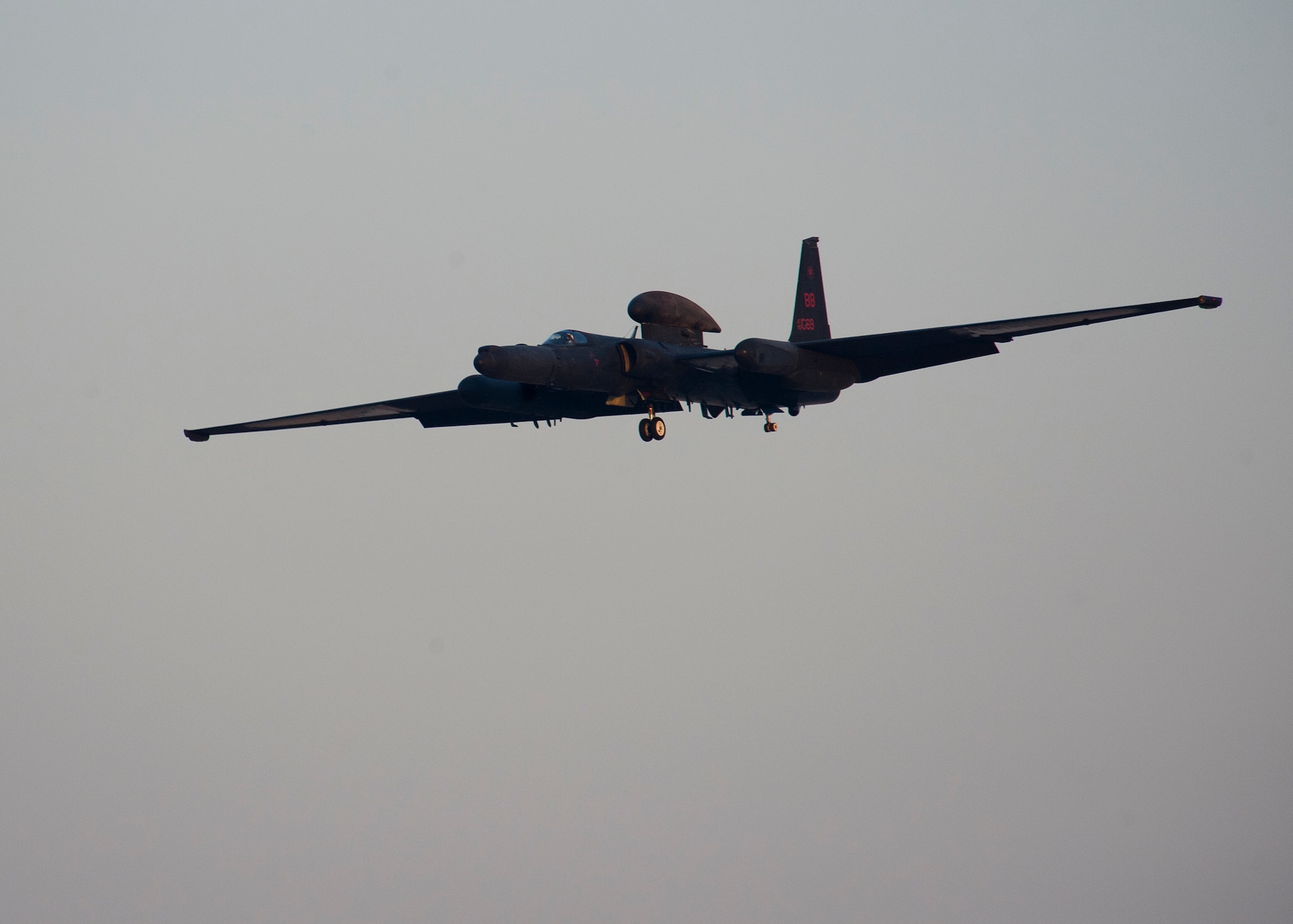 Air Force Maj. Ralph Shoukry, a pilot and tactics and employment lead assigned to the 99th Expeditionary Reconnaissance Squadron, flies a U-2 Dragonlady in for landing after reaching more than 1,000 combat hours at an undisclosed location in Southwest Asia, March 6, 2014. Shoukry reached this feat after his ninth deployment and 113th combat sortie. (U.S. Air Force photo by Staff Sgt. Michael Means/Released)
