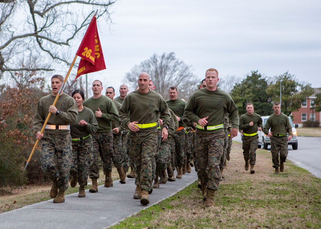 U.S. Marines assigned to 26th Marine Expeditionary Unit (MEU) Command Element (CE) conduct a formation run led by the unit’s non-commissioned officers (NCOs), aboard Camp Lejeune, N.C., Feb. 26, 2014. The physical training was conducted to foster unit cohesion and give NCOs the opportunity to coordinate and run a unit level event. (U.S. Marine Corps photo by Sgt. Christopher Q. Stone, 26th MEU Combat Camera/Released) 