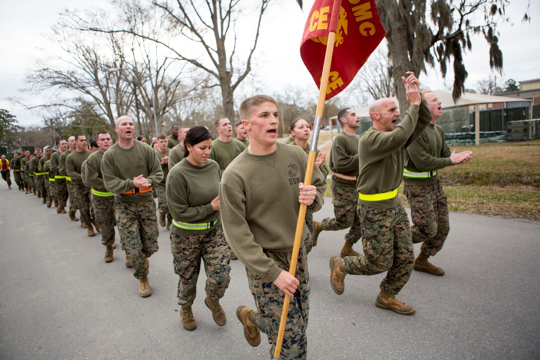 U.S. Marines assigned to 26th Marine Expeditionary Unit (MEU) Command Element (CE) conduct a formation run led by the unit’s non-commissioned officers (NCOs), aboard Camp Lejeune, N.C., Feb. 26, 2014. The physical training was conducted to foster unit cohesion and give NCOs the opportunity to coordinate and run a unit level event. (U.S. Marine Corps photo by Sgt. Christopher Q. Stone, 26th MEU Combat Camera/Released) 