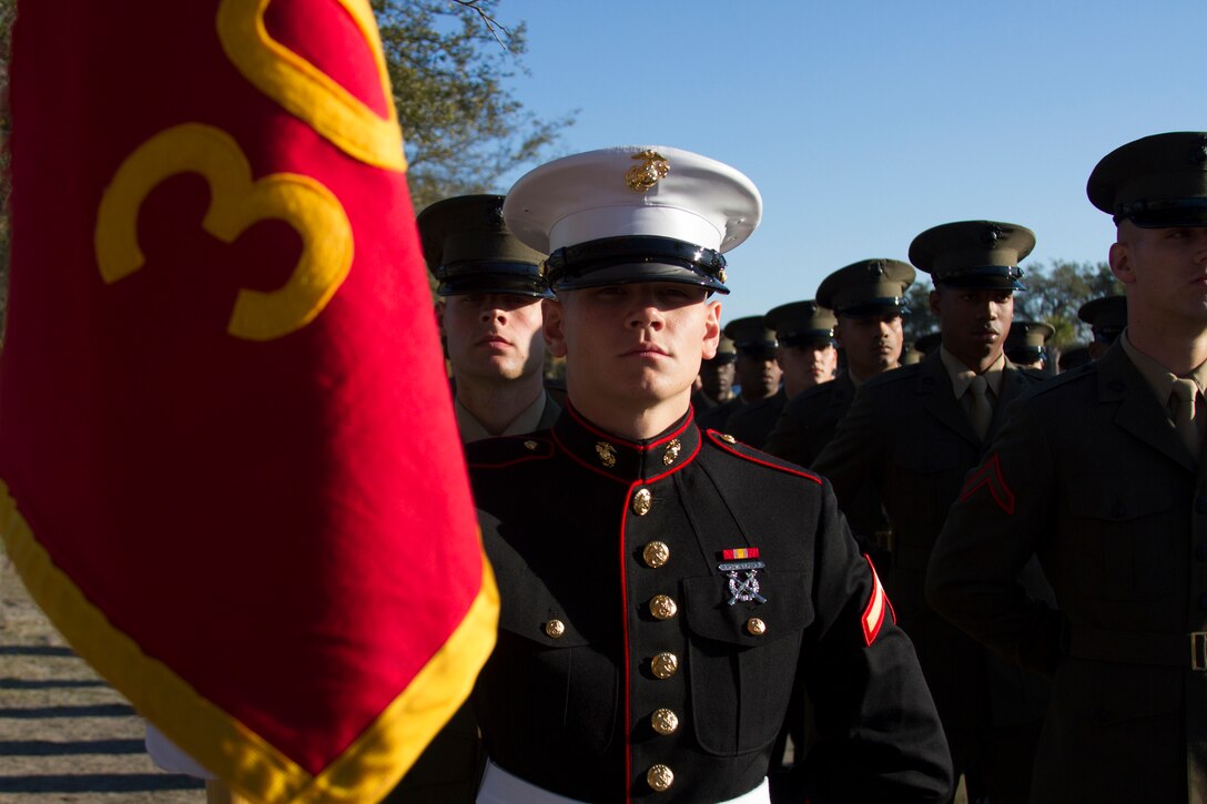 MARINE CORPS RECRUIT DEPOT PARRIS ISLAND, S.C. - Pfc. Brady A. Christian, the honor graduate for platoon 3016, stands at parade rest before marching onto the parade deck at graduation here, March 14, 2014. Christian, a Heath Springs, S.C. native, was recruited by Staff Sgt. John York, a recruiter from Marine Corps Recruiting Sub Station Monroe, Recruiting Station Columbia. Recruit training signifies the transformation of a civilian to a United States Marine. Upon graduation, the newly-minted Marines will receive ten days of leave before attending the School of Infantry East, Camp Gieger, N.C. The Marines will be trained in basic infantry skills and ensure that the Marines are combat-ready.(Photo by Lance Cpl. Stanley Cao)
