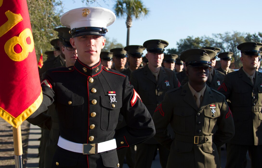 MARINE CORPS RECRUIT DEPOT PARRIS ISLAND, S.C. - Pfc. Matthew C. Cumer, the honor graduate for platoon 3018, stands at parade rest before marching onto the parade deck at graduation here, March 14, 2014. Cumer, a Horn Lake, Miss. Native, was recruited by Sgt. Marneze Davis, a recruiter from Marine Corps Recruiting Sub Station Southaven, Recruiting Station Nashville. Recruit training signifies the transformation of a civilian to a United States Marine. Upon graduation, the newly-minted Marines will receive ten days of leave before attending the School of Infantry East, Camp Gieger, N.C. The Marines will be trained in basic infantry skills and ensure that the Marines are combat-ready.(Photo by Lance Cpl. Stanley Cao) 