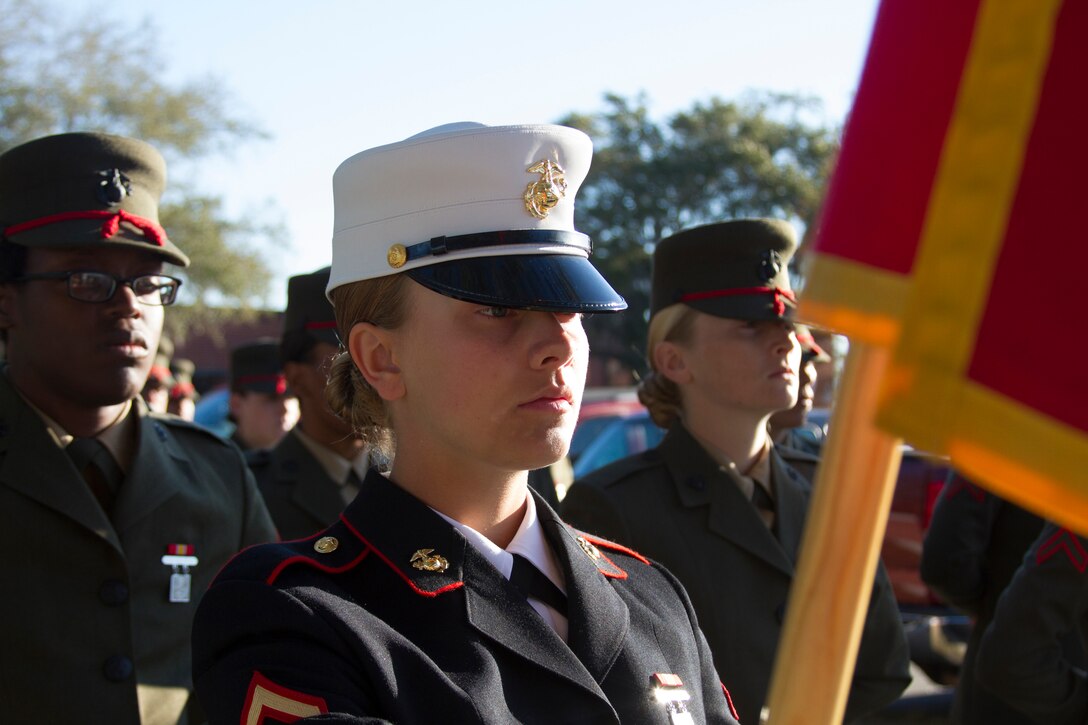 MARINE CORPS RECRUIT DEPOT PARRIS ISLAND, S.C. - Pfc. Paris M. Winter, the platoon honor graduate for 4008, stands at parade rest before marching onto the parade deck at graduation here, March 14, 2014. Winter, a Fort McCoy, Fla. native, was recruited by Sgt. Trace Thomas, a recruiter from Marine Corps Recruiting Sub Station Gainesville, Recruiting Station Jacksonville. Recruit training signifies the transformation of a civilian to a United States Marine. Upon graduation, the newly-minted Marines will receive ten days of leave before attending the School of Infantry East, Camp Gieger, N.C. The Marines will be trained in basic infantry skills and ensure that the Marines are combat-ready.(Photo by Lance Cpl. Stanley Cao) 